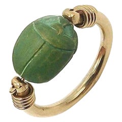 Egyptian Revival Green Scarab 12K Gold Swivel Ring, circa 1920