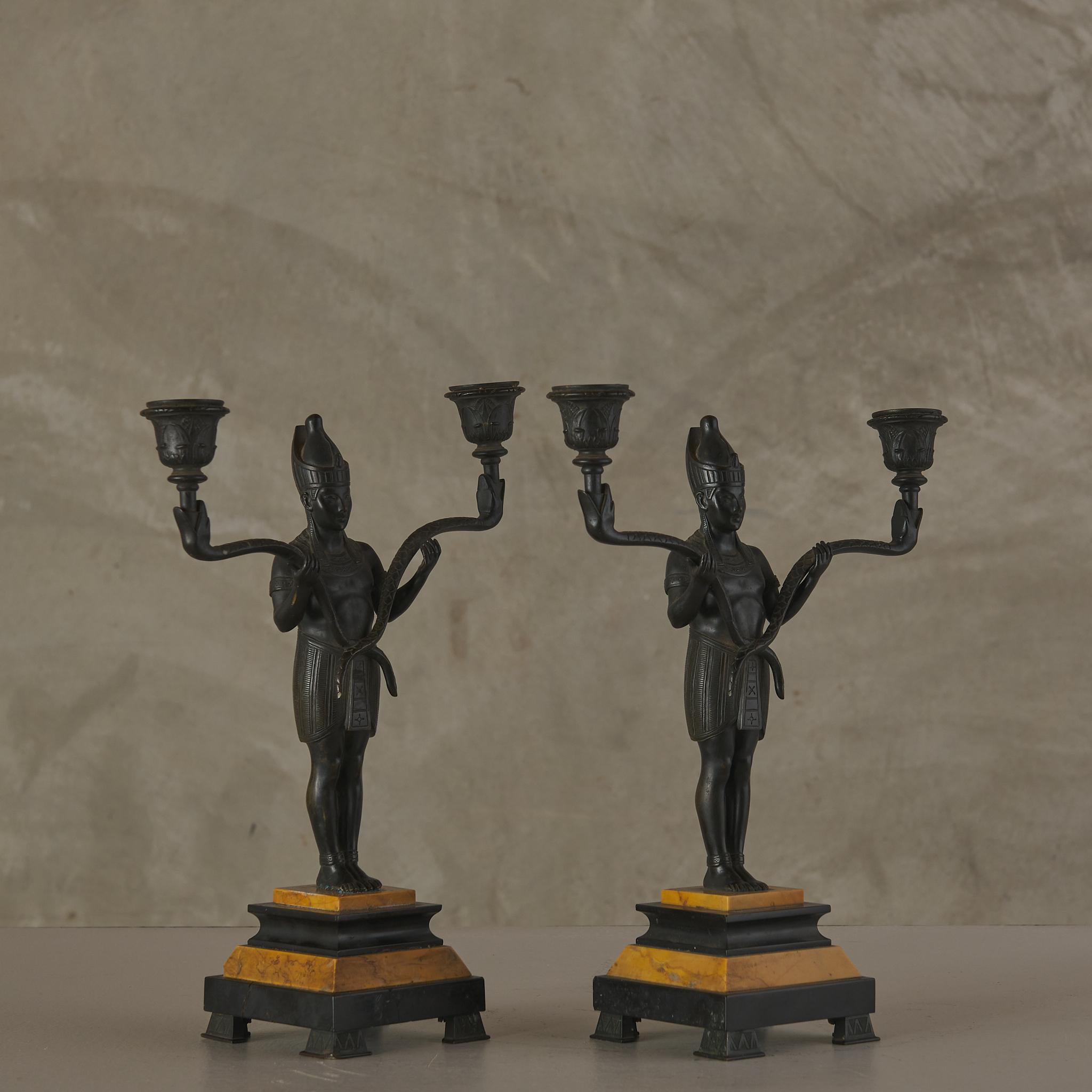 Late 19th Century Egyptian Revival Marble Clock with Two Candelabra Granitures For Sale