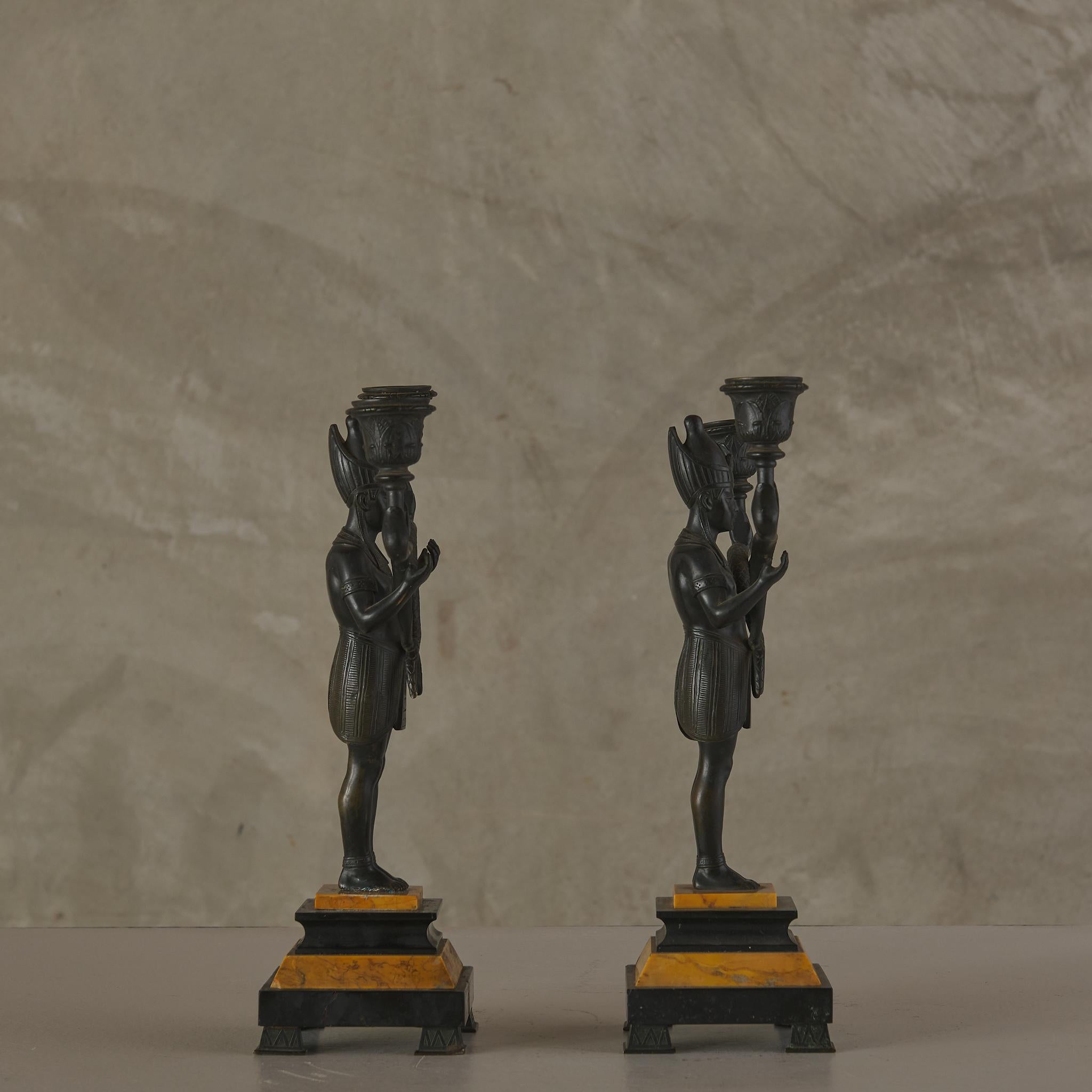Bronze Egyptian Revival Marble Clock with Two Candelabra Granitures For Sale