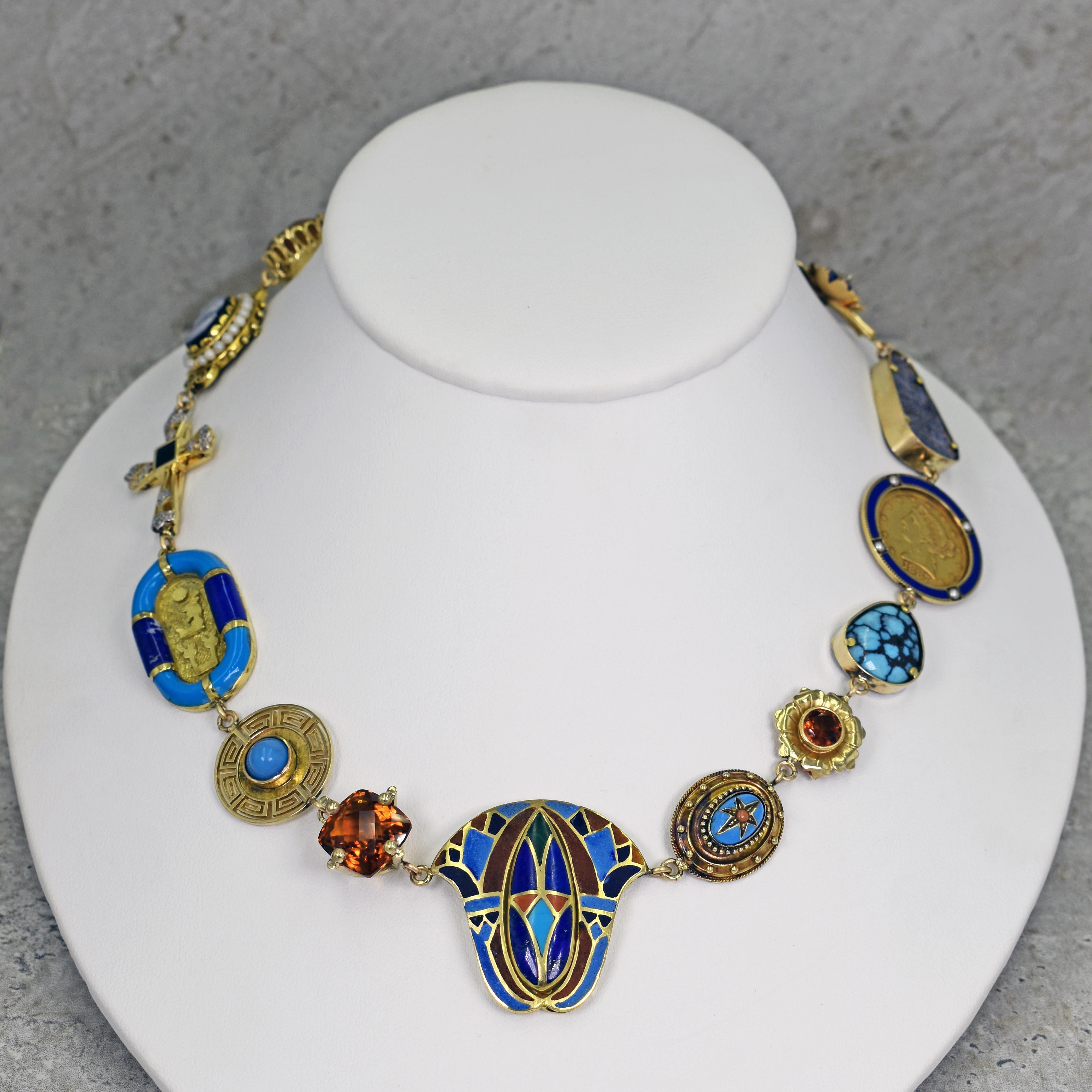 One-of-a-kind Vicki Orr 14k yellow gold Bohemian necklace with a variety of gemstones and vintage and antique jewelry components in an eclectic Egyptian revival style. Necklace has 15 unique pieces, featuring Blue Sapphire, Diamond, Carnelian,