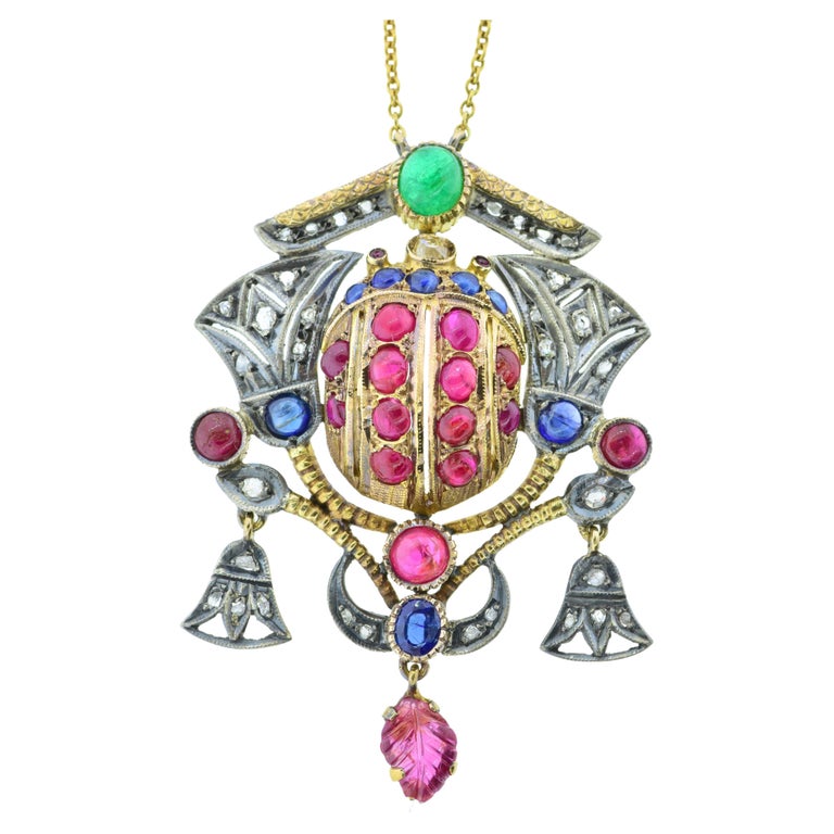 Egyptian Revival Necklace with Diamonds, Rubies, Sapphires and Emerald, c. 1920 For Sale