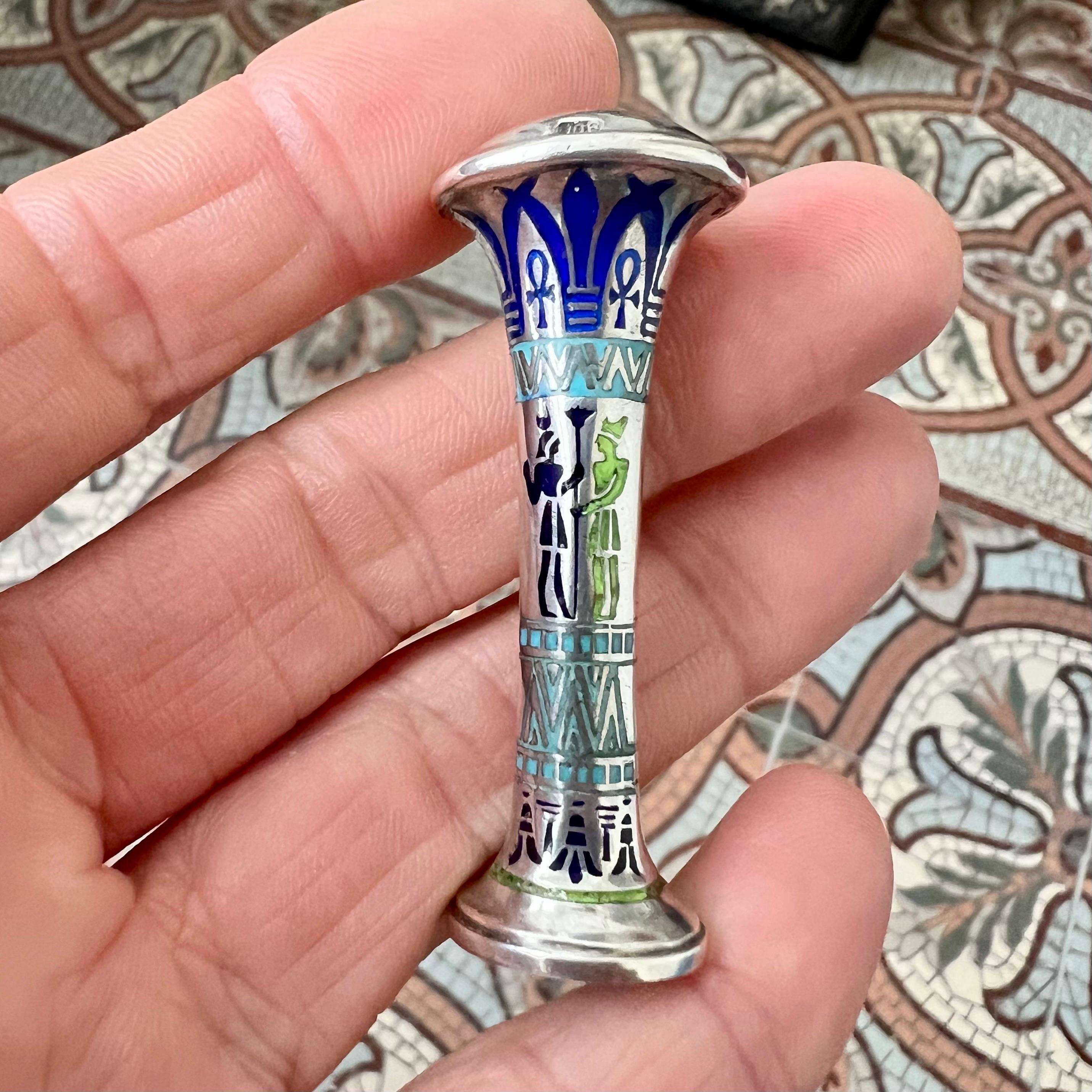 A rare and finely executed Egyptian Revival desk seal in silver, richly decorated with cloisonné enamel, dating to the Art Deco period, circa 1920s–1930s. This elegant object, known in Dutch as a lakstempel, beautifully captures the fascination with