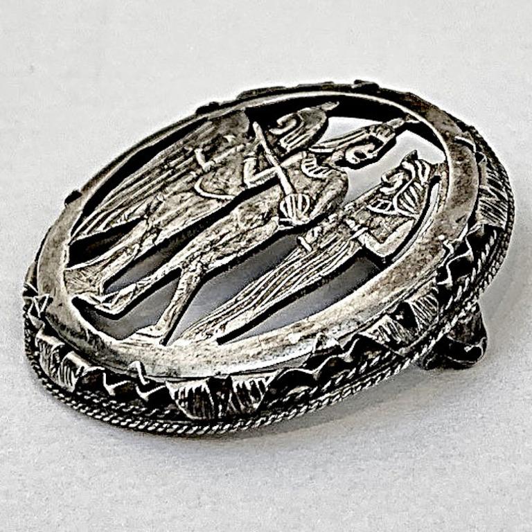 Wonderful Egyptian Revival silver brooch with Egyptian hallmarks, in a lovely rope twist setting. Measuring diameter 3.6 cm / 1.4 inches. The brooch tests for silver and is in very good condition. We have given it a light clean.

This is a beautiful