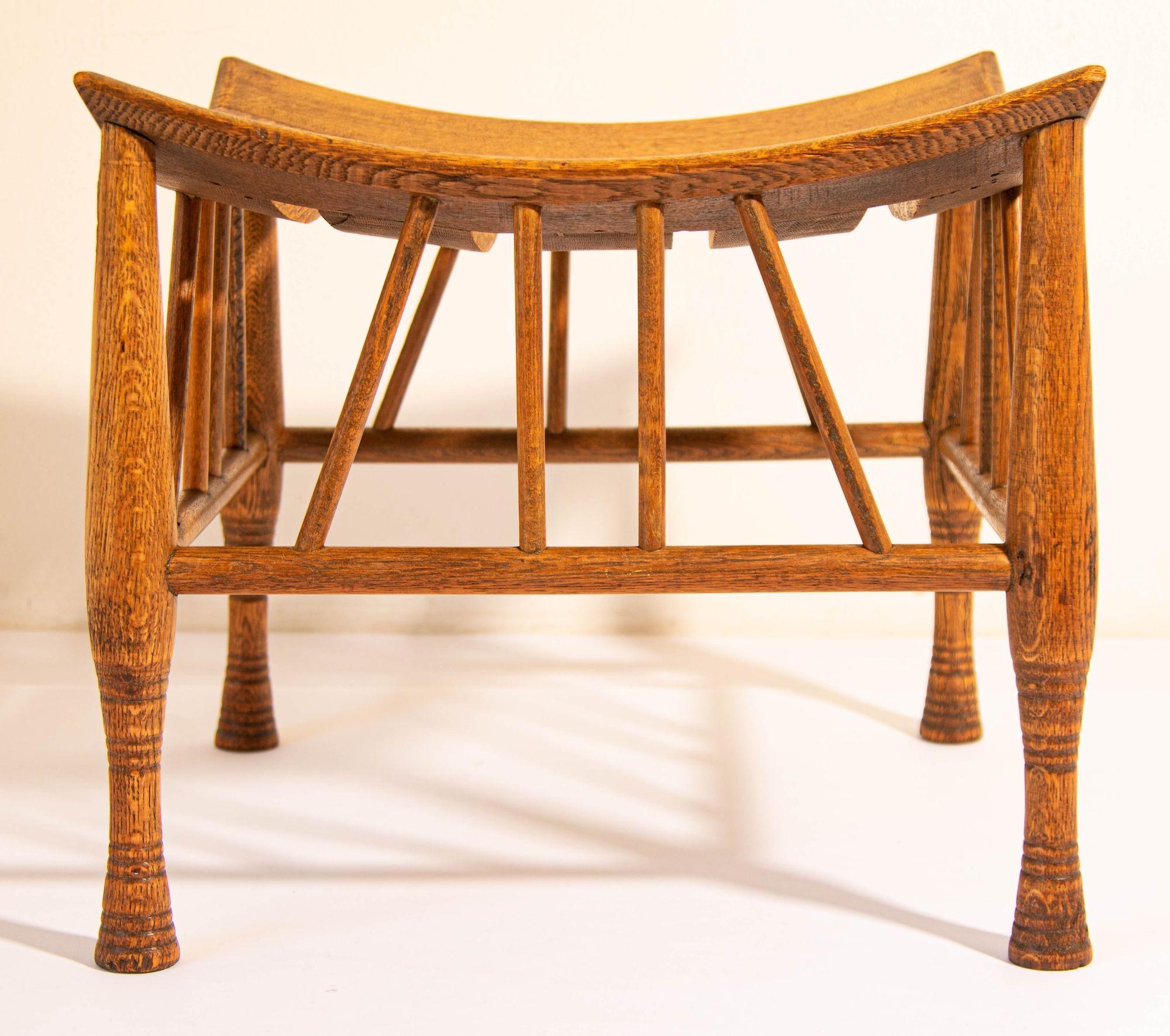 1920s Egyptian Revival Light Slat Oak Thebes Stool, Liberty & Co attributed.
Walnut Egyptian Revival Thebe Stool.
Liberty & Company London /Leonard Wyburd.
This vintage 'Thebes' stool, produced within the early 20th century period is attributed to