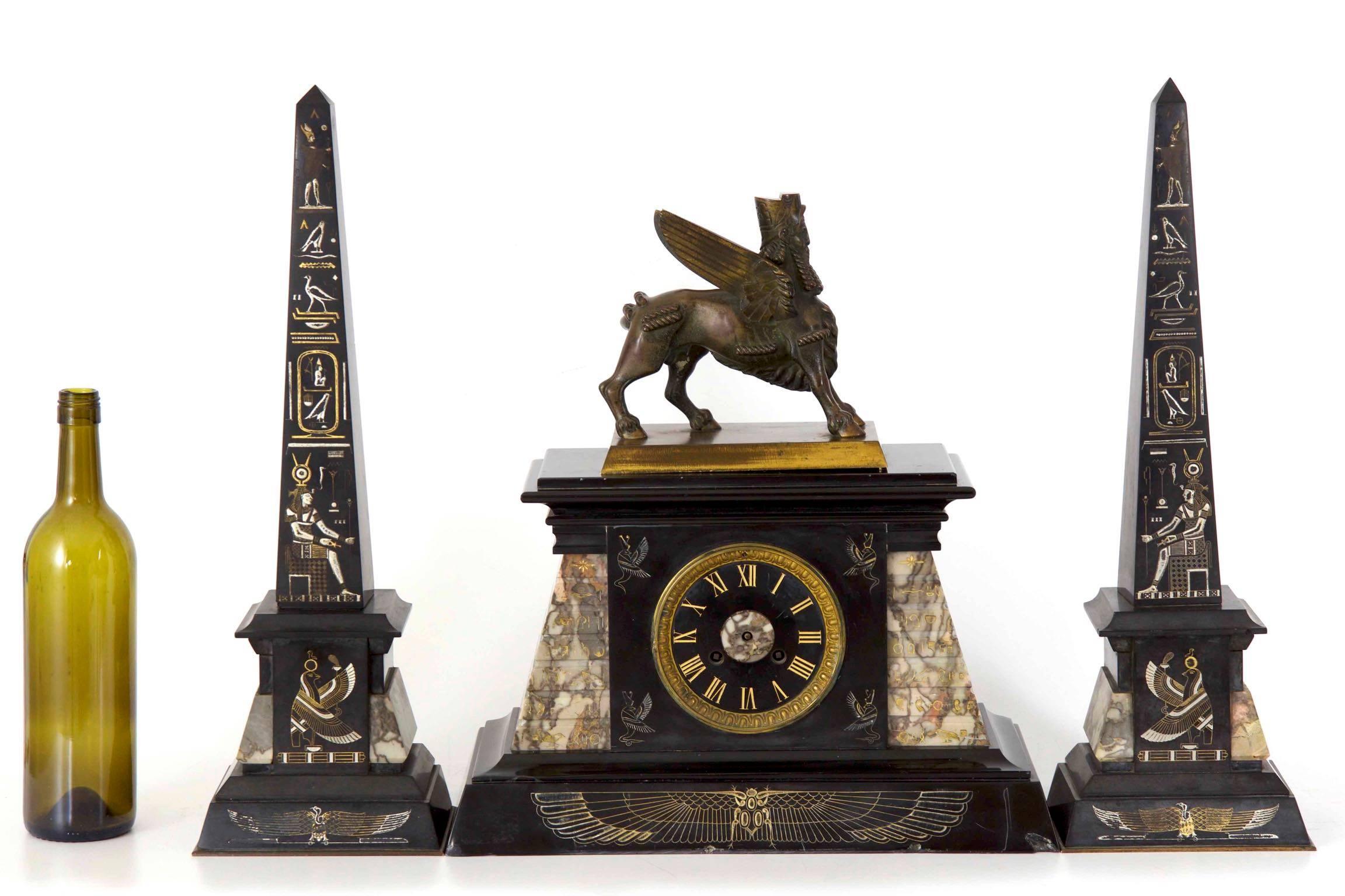 A powerful expression of the cultural curiosity in the mysteries and discoveries of ancient Egypt during the late 19th century, this very finely decorated clock is incised with a full array of hieroglyphics and Egyptian motif. The mantel clock is
