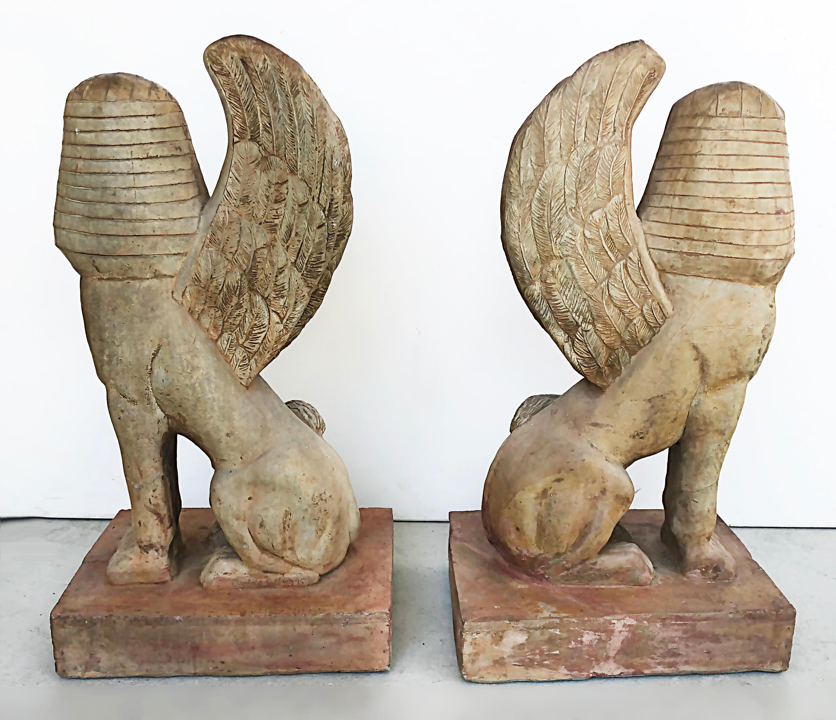 American Egyptian Revival Winged Sphinx Garden Sculptures/Ornaments, a Pair