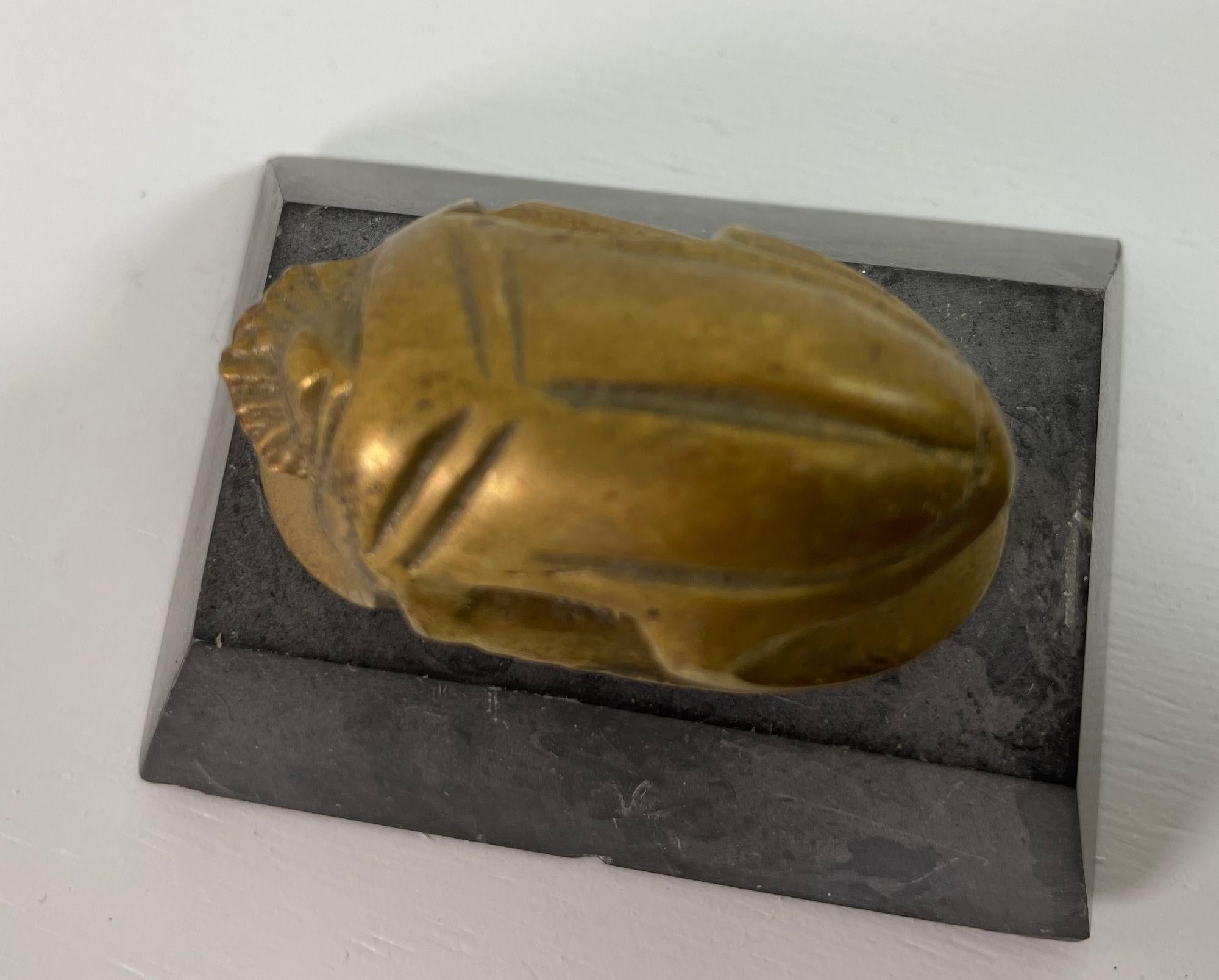 Egyptian Scarab Brass Beetle Figurine on Black Stone Stand In Good Condition For Sale In North Hollywood, CA