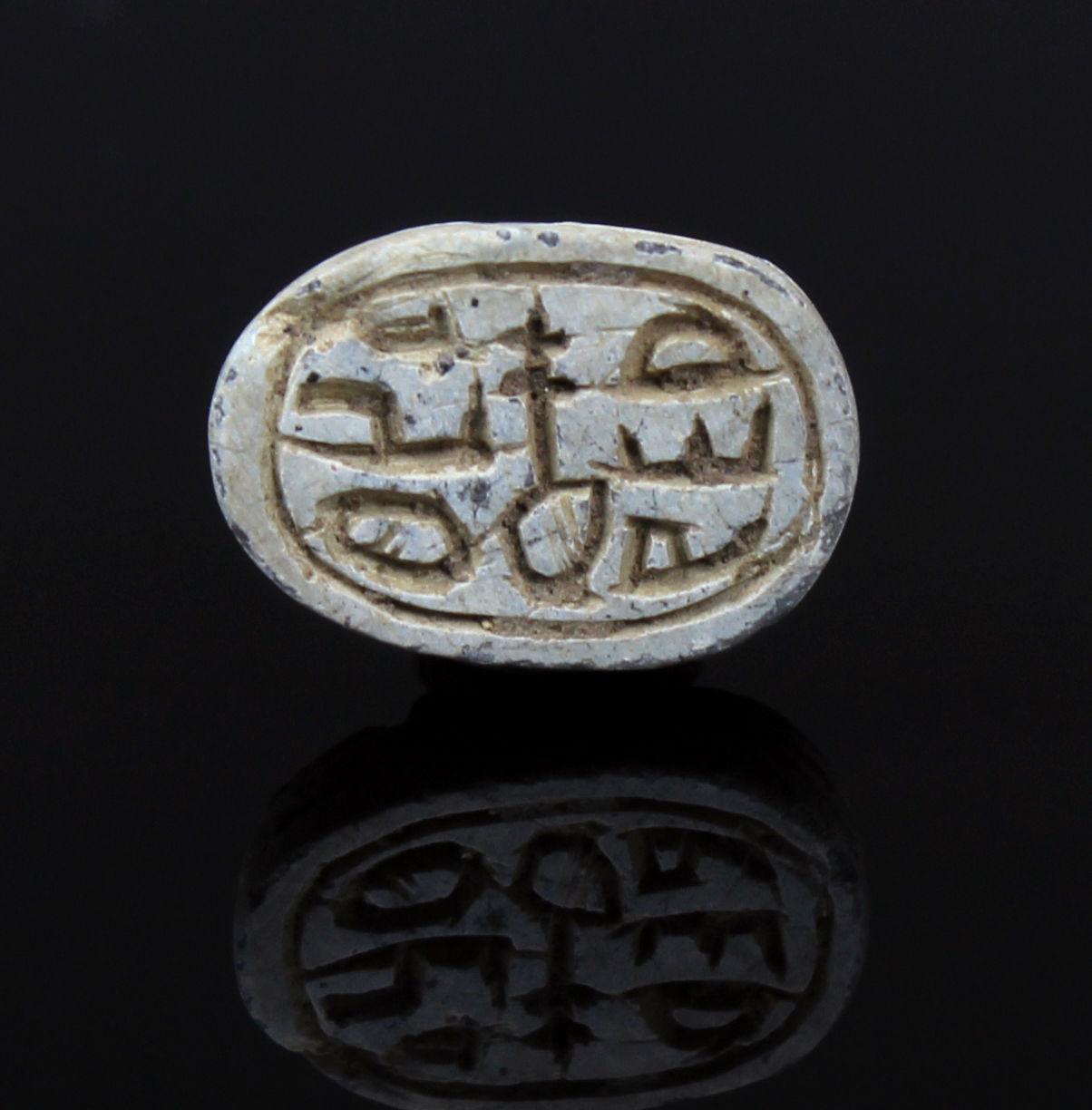 ITEM: Scarab with pseudo-hieroglyphic, Anra-type
MATERIAL: Steatite
CULTURE: Egyptian
PERIOD: Second Intermediate Period, 1700 – 1550 B.C
DIMENSIONS: 10 mm x 15 mm
CONDITION: Good condition
PROVENANCE: Ex American egyptologist collection, active in