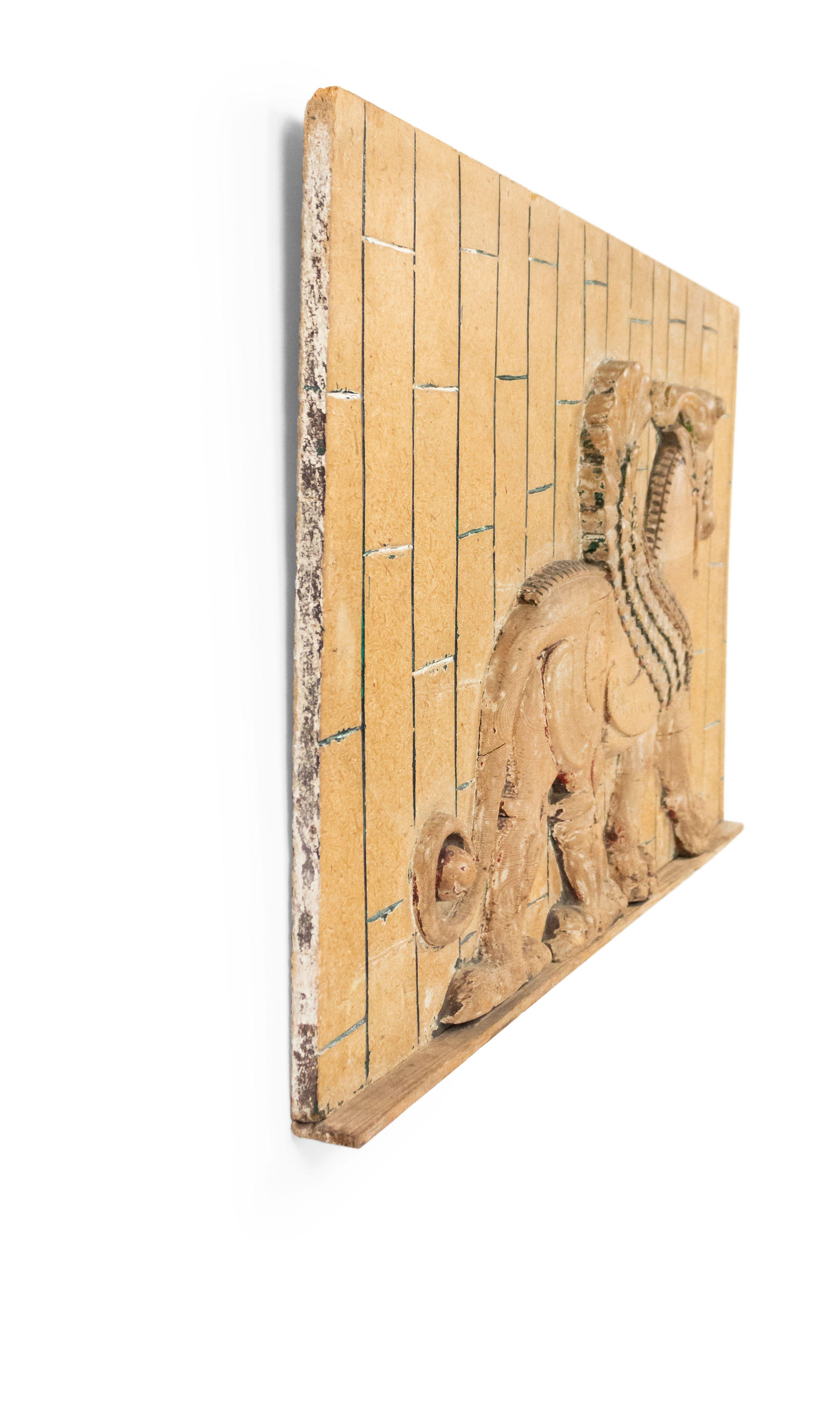 20th Century Egyptian Style Carved Wooden Wall Plaque of a Winged Bull For Sale