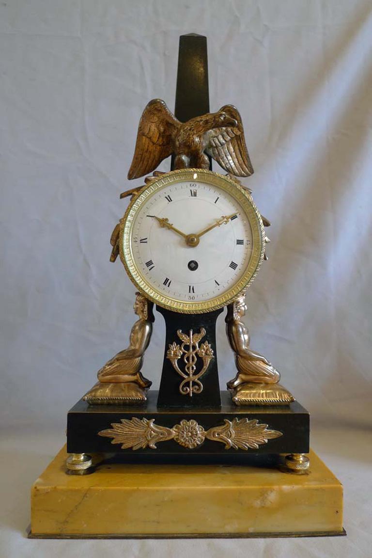 Egyptian Revival Egyptian Style Clock Set in Patinated Bronze and Sienna Marble For Sale