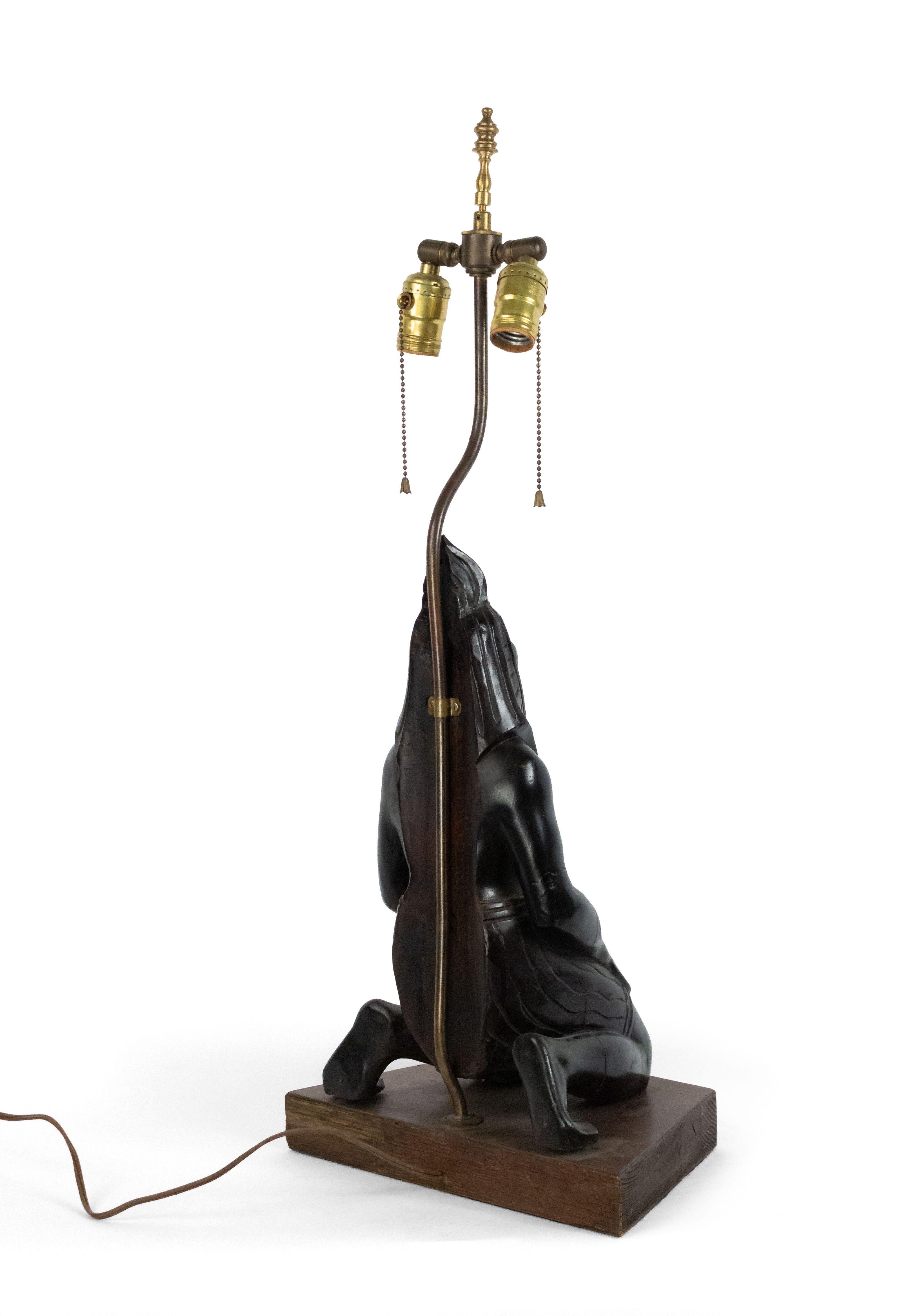 Carved Egyptian Style Ebonized Figural Table Lamps For Sale