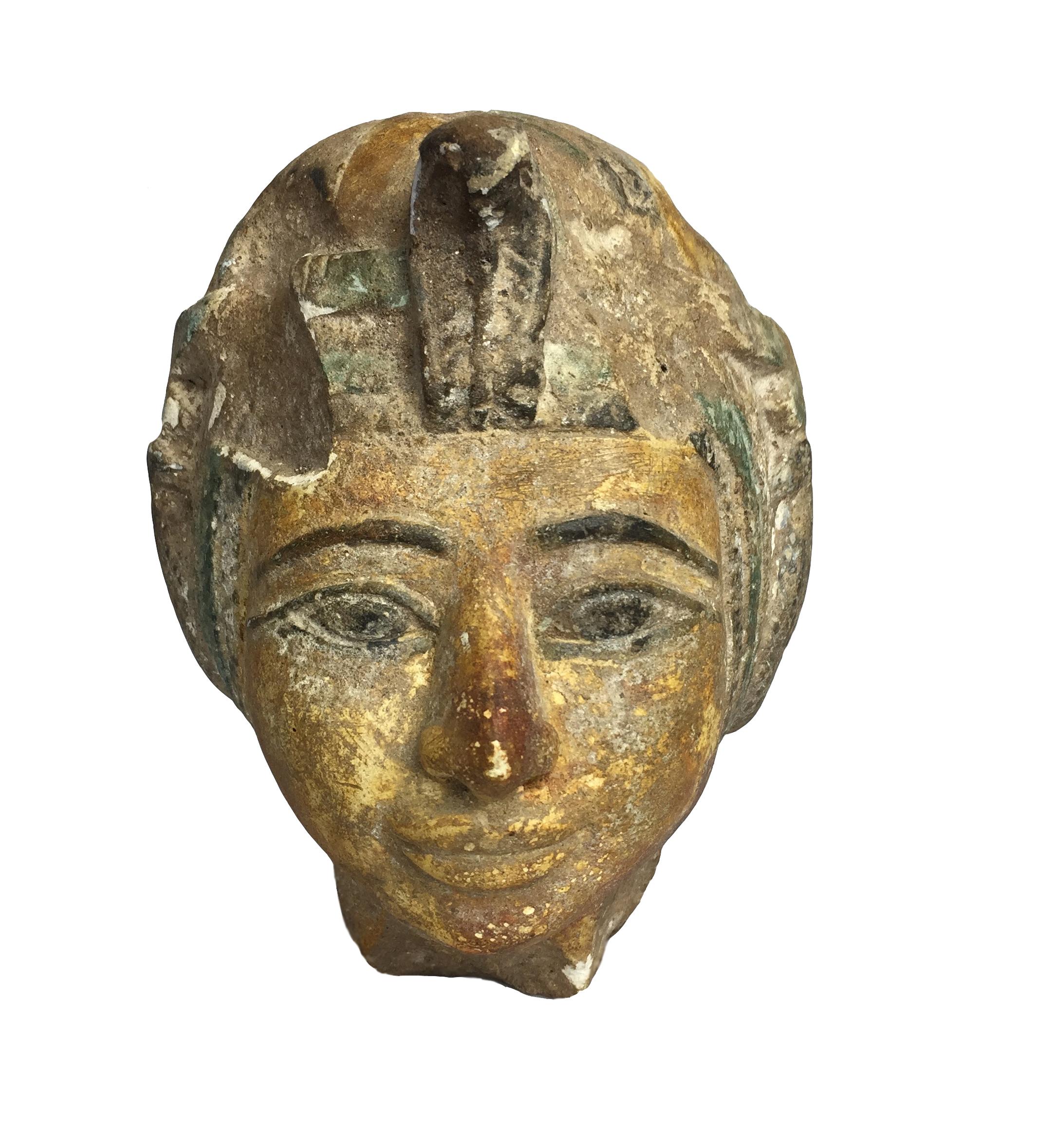 A wonderfully decorative polychromed limestone head in the Egyptian style.

The shape and weight of the head makes it a very impressive artefact with excellent workmanship.

Most probably 19th century. Would look fantastic in the cabinet of