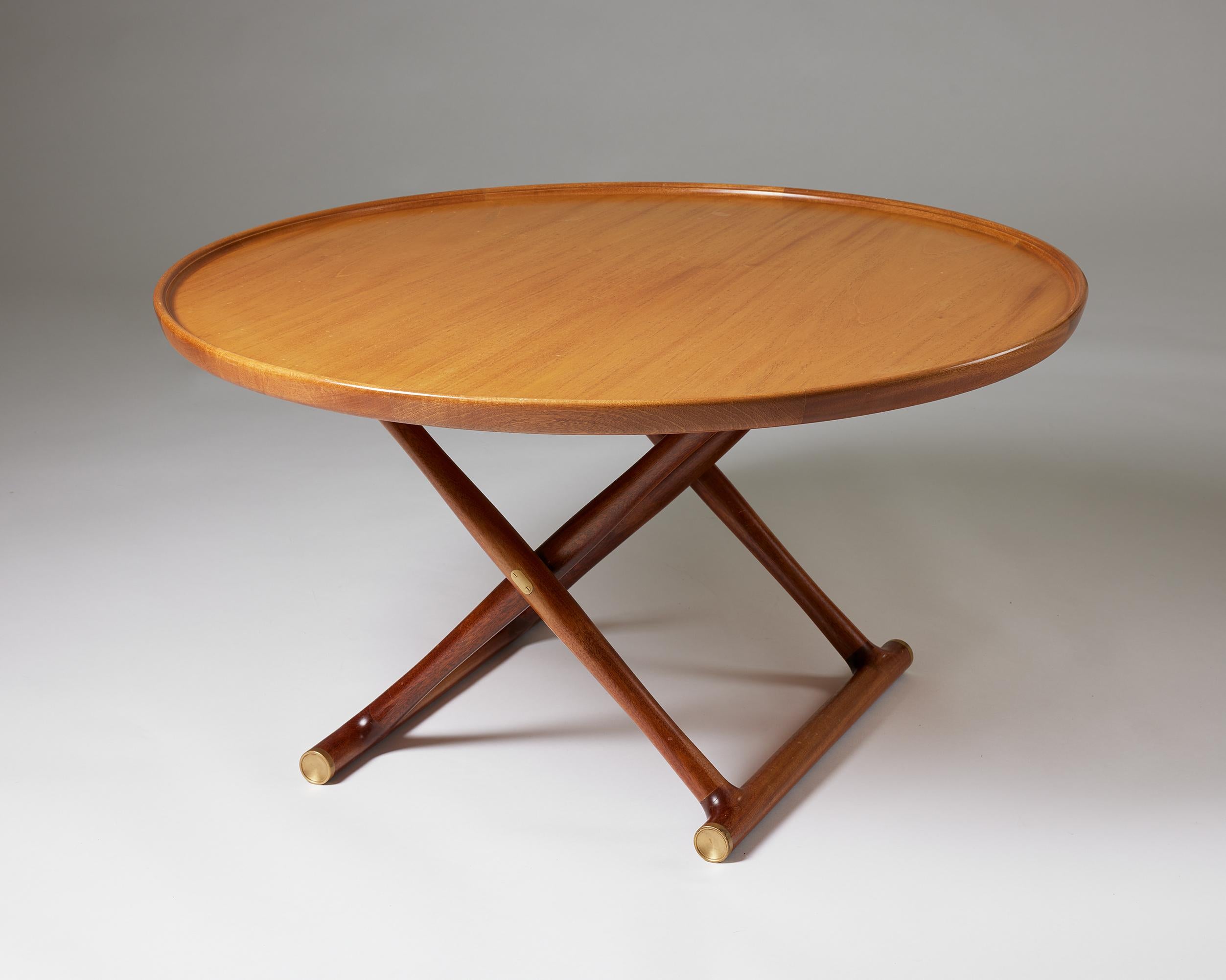 ‘Egyptian Table’ designed by Mogens Lassen for Rud. Rasmussen,
Denmark, 1935.

Mahogany and brass.

A rare larger version of the 'Egyptian Table'.

H: 53 cm / 20 3/4''
D: 100 cm / 3' 3 1/4''.