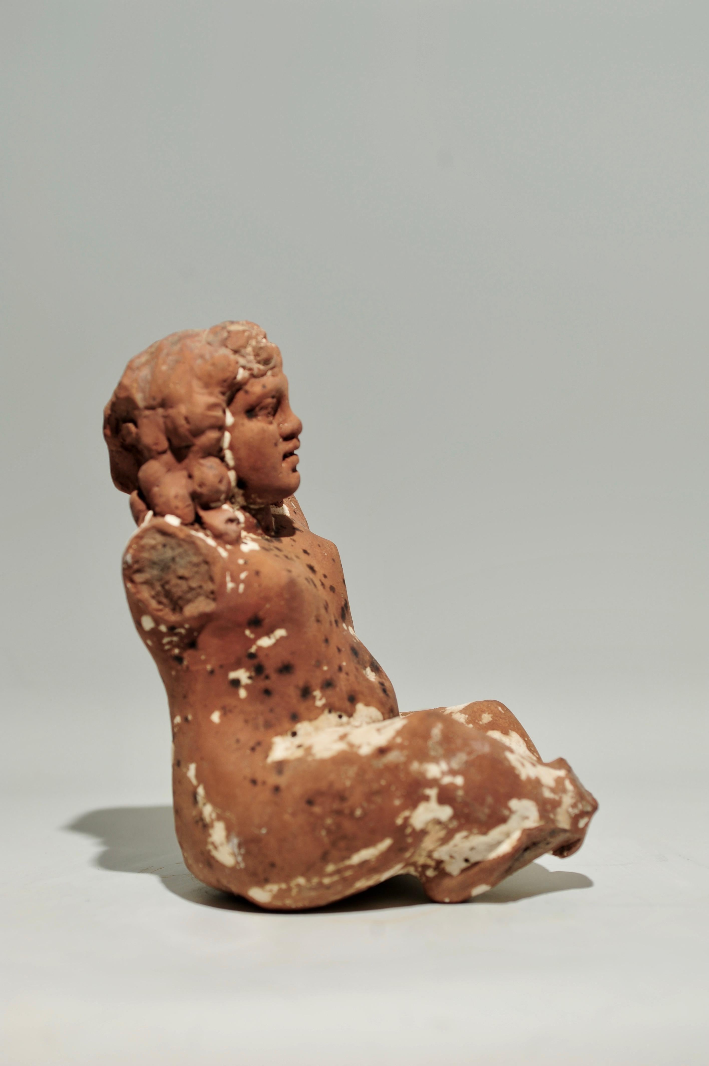 African Egyptian Terracota Statuette of the Seated Harpocrates For Sale