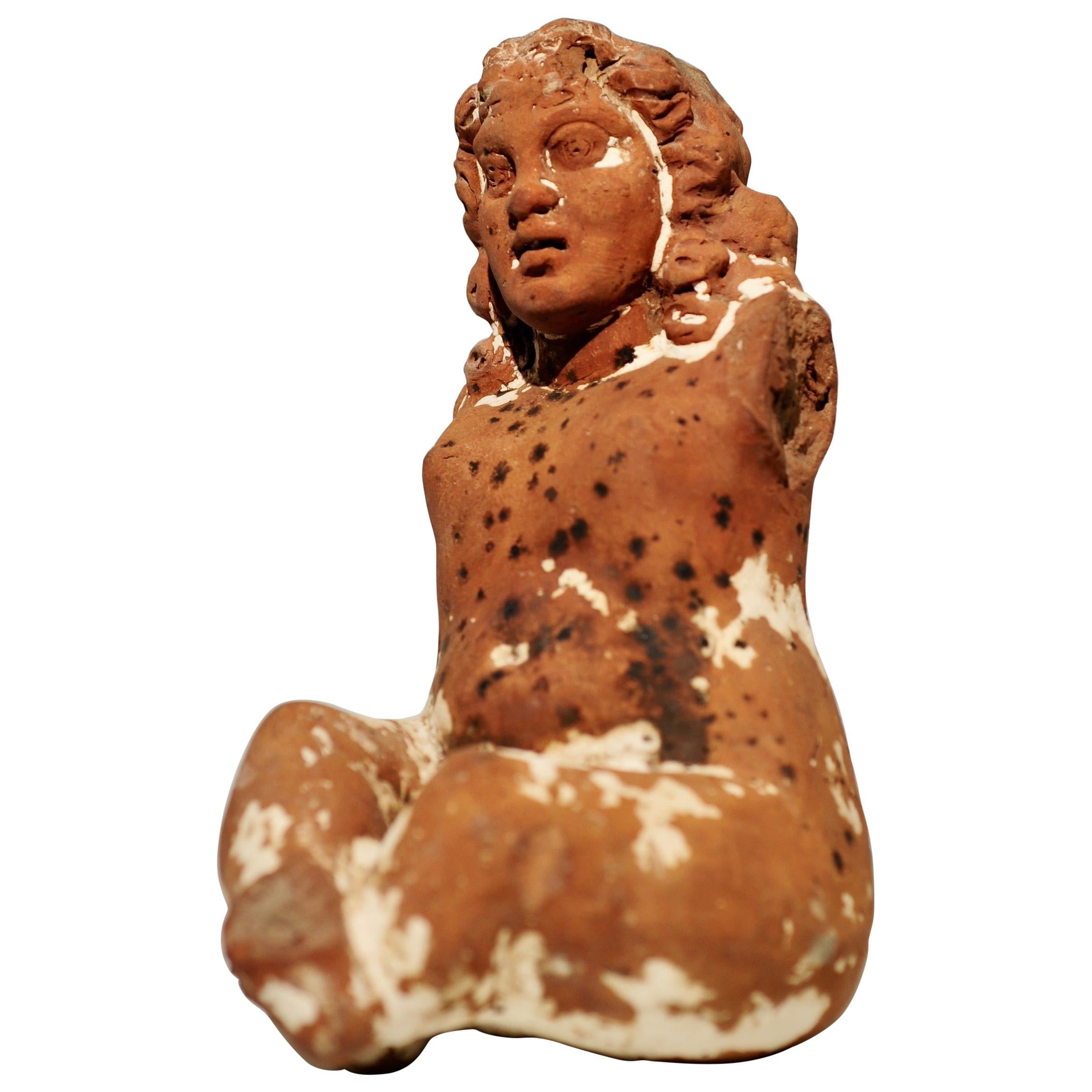 Egyptian Terracota Statuette of the Seated Harpocrates For Sale