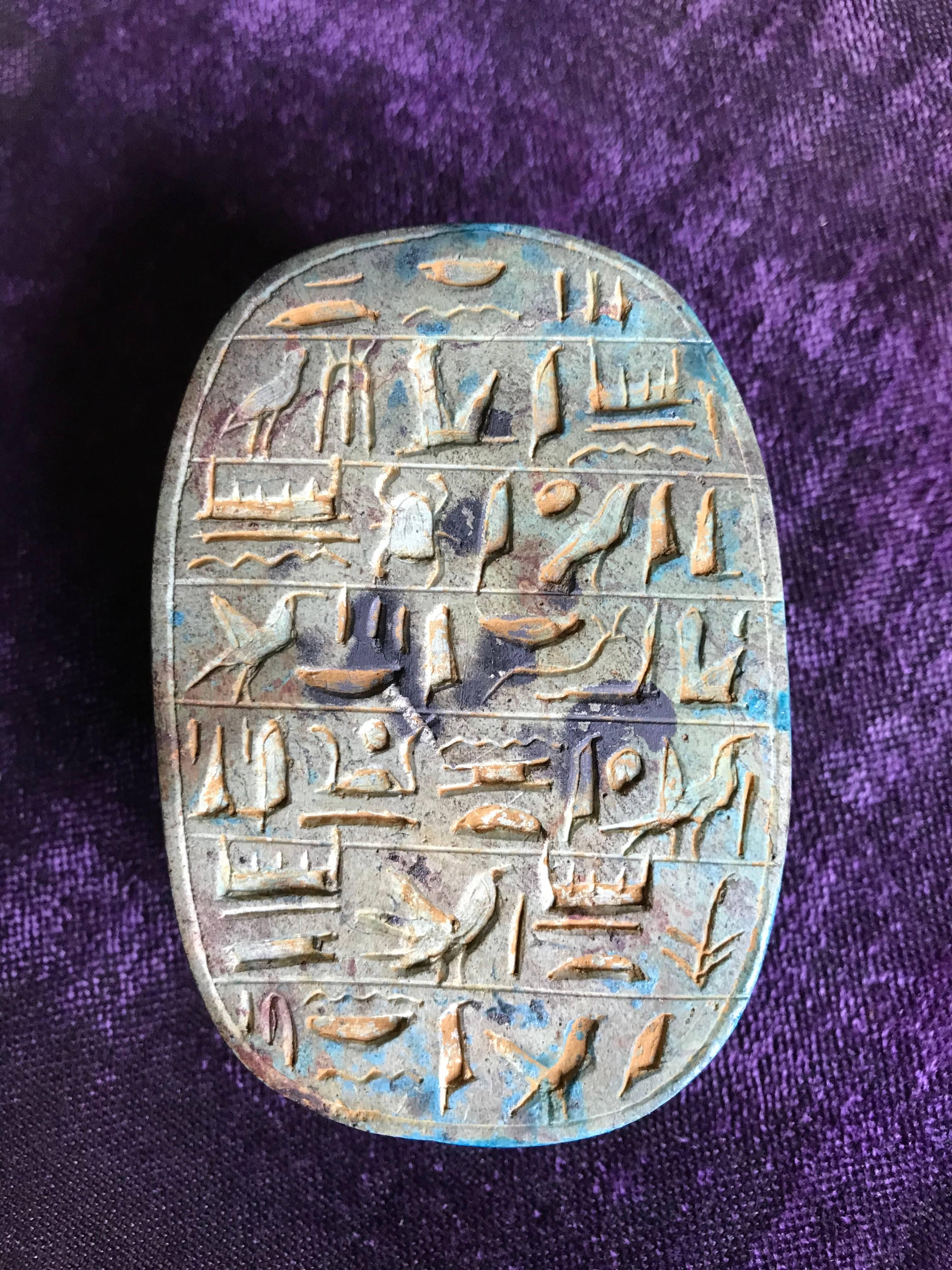 Beautifully realized Egyptian faience scarab with turquoise glaze in the ancient style, Grand Tour period, late 19th century. The open-work scarab beetle shown with twin cobras on the back. The bottom inscribed with hieroglyphics, probably lines