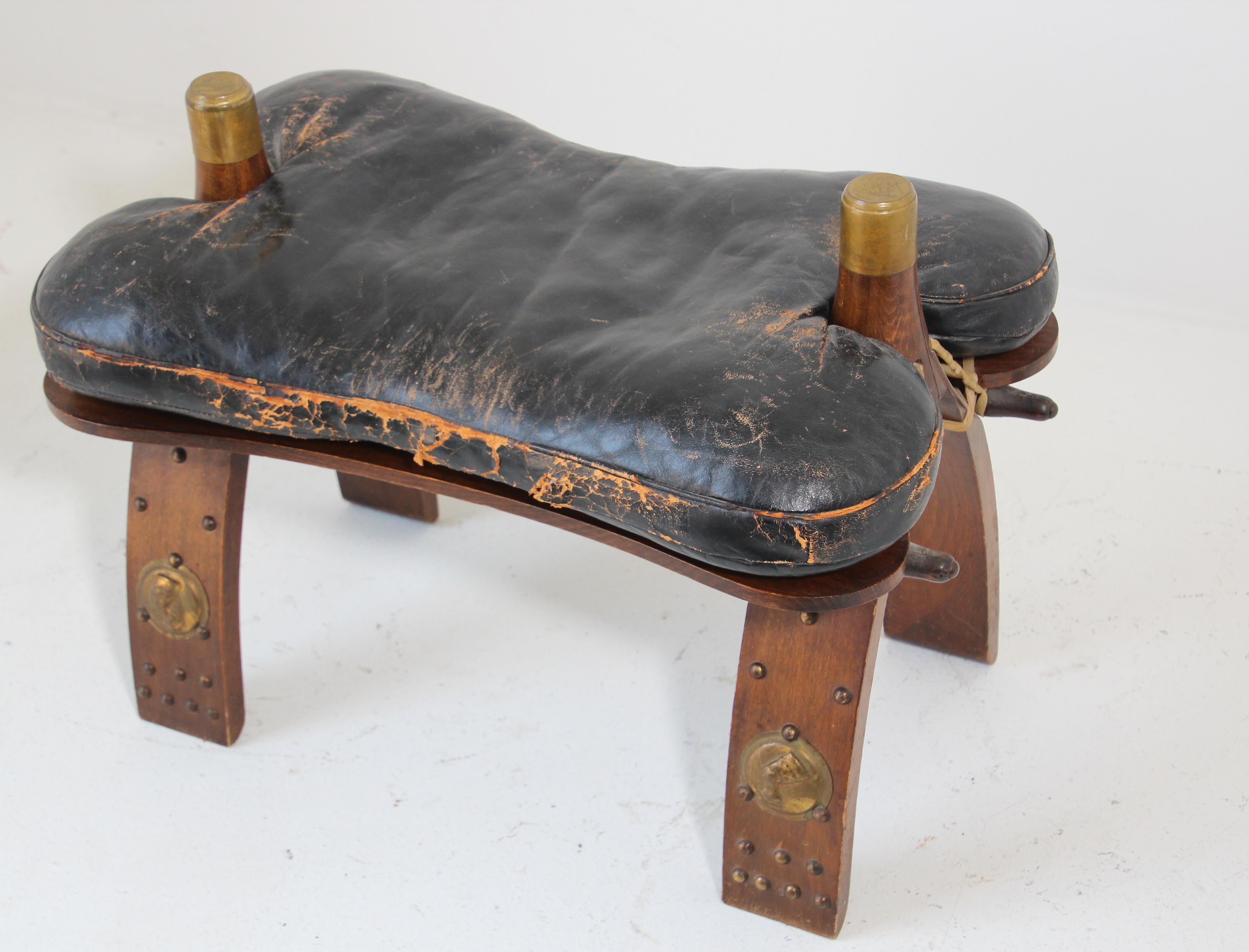 Vintage Egyptian, North Africa camel saddle shape stool.
Traditionally used to ride camels in the desert of Africa and the Middle East, this camel saddle could be used as a foot stool or just as an accent tribal piece in any room.
Wooden base is
