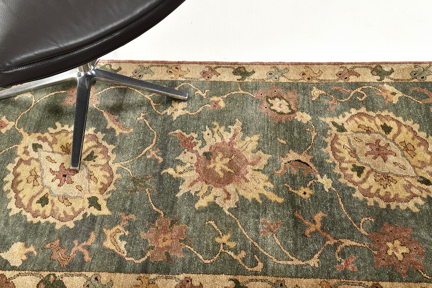 Wonderful vines and florid adornments are expressed through neutral embellishments to blooming and fascinating green fields. The borders are beautifully woven that created vigorously to form an elegant Zigler Rug. Truly an extraordinary creation