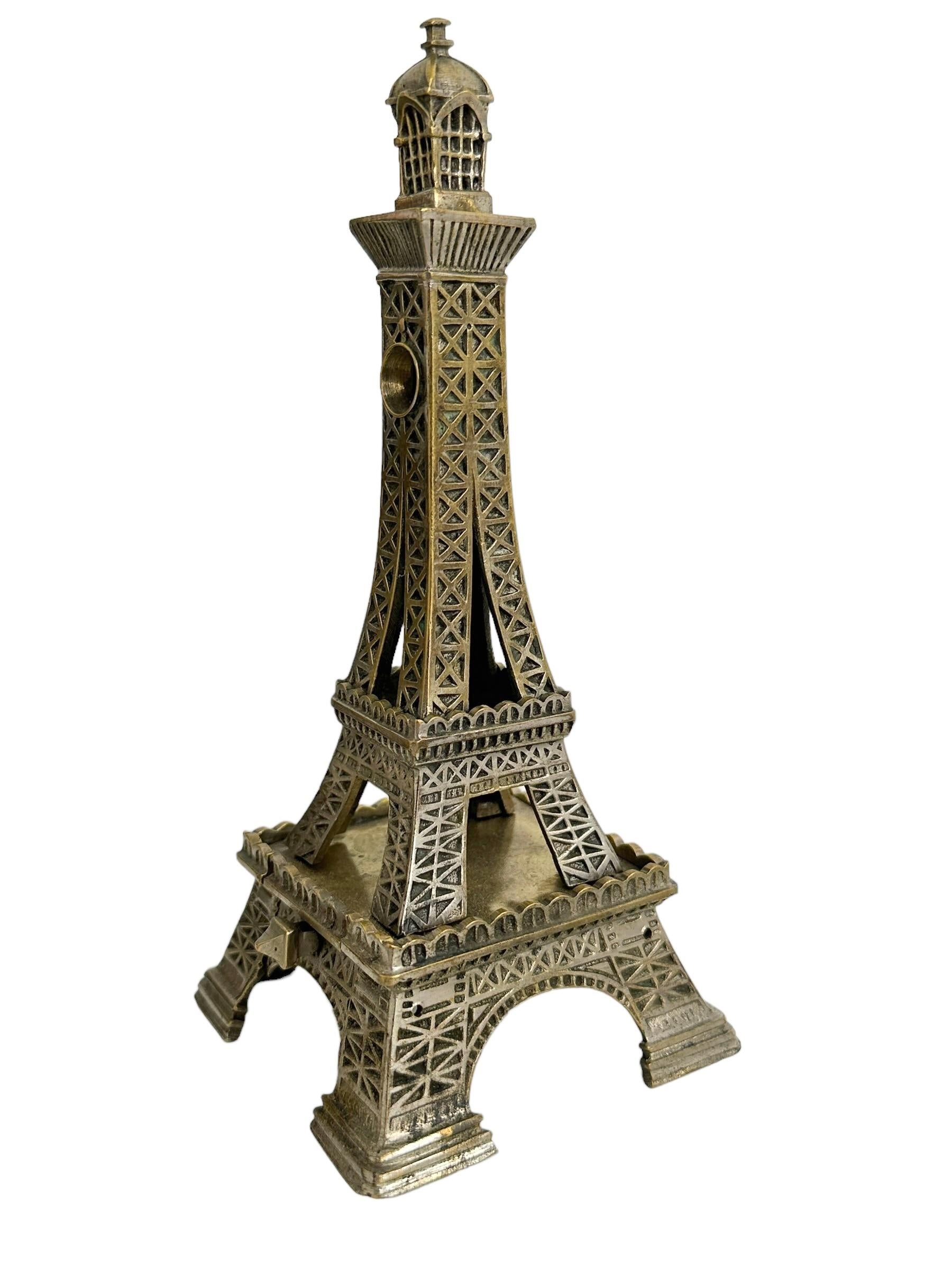 A beautiful cigar cutter and matchstick holder Building. Some wear with a nice patina, but this is old-age. Made of brass and silver-plated. Steel cutting blade at the topl. Blade rusty but this does not affect the function in any way. A beautiful