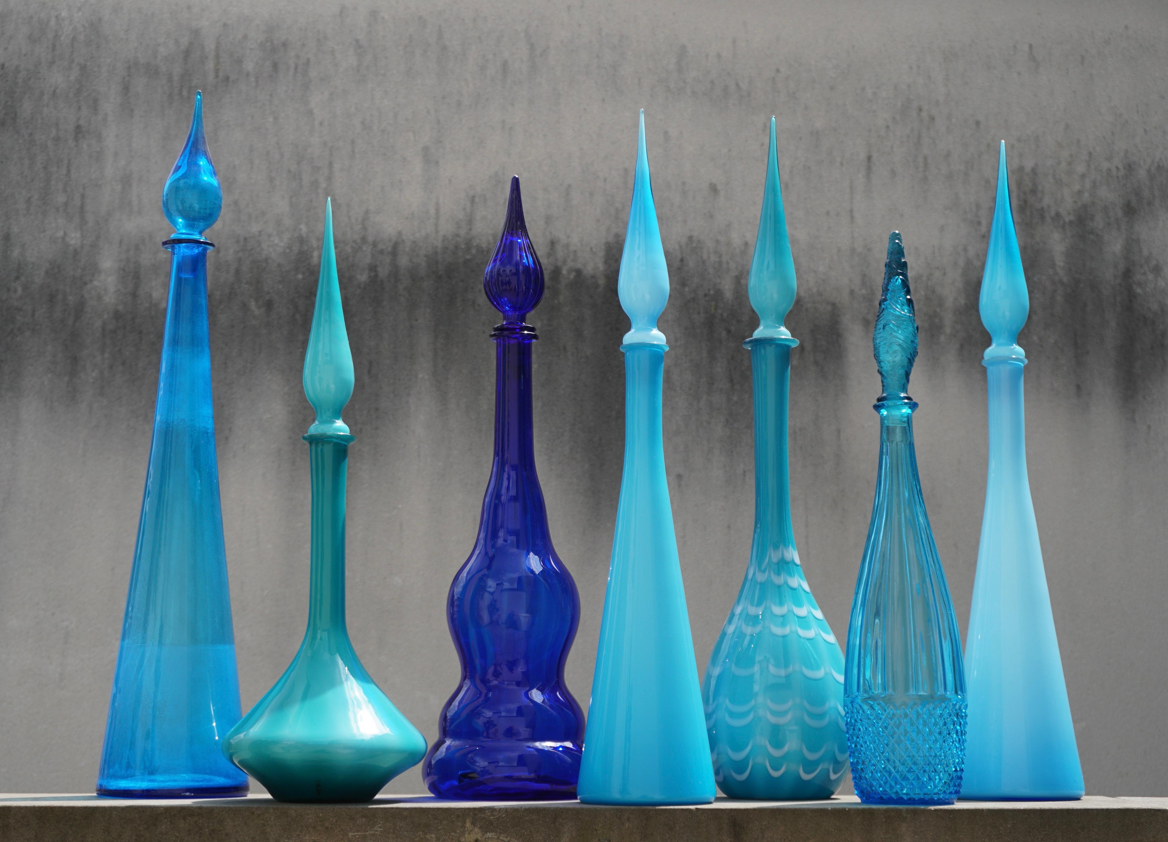 Hollywood Regency Eight 1960s Blue Italian Empoli Rossini Glass Decanters For Sale