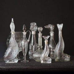 Eight 1960s Clear Glass Italian Empoli Duck Dog Fish Decanters Bottles and Vases