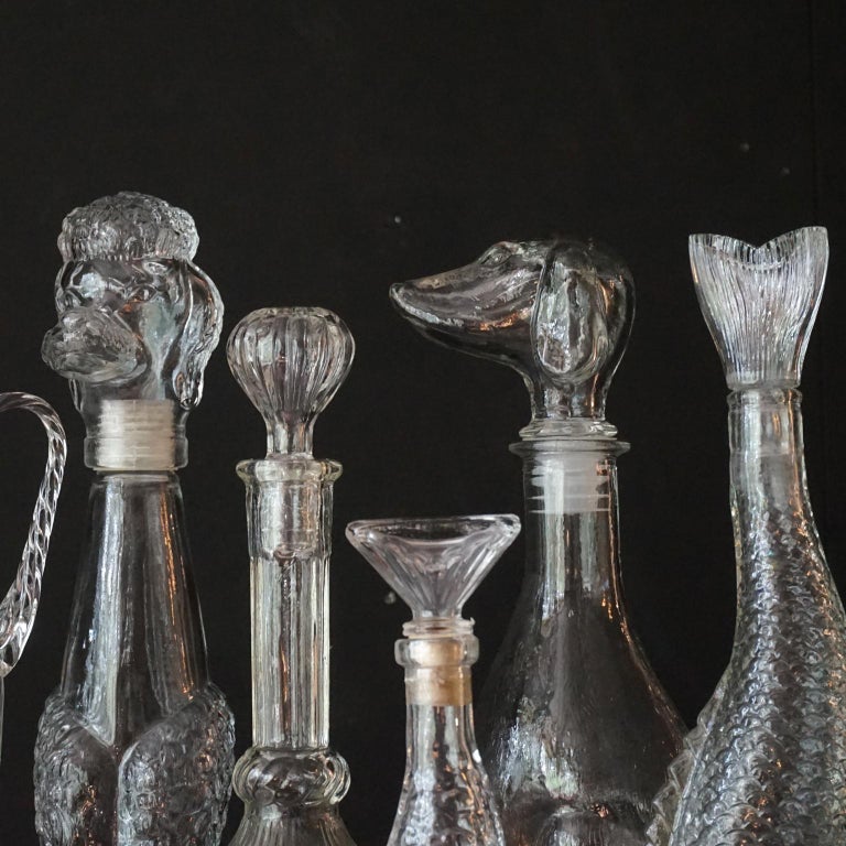 Eight 1960s Clear Glass Italian Empoli Duck Dog Fish Decanters Bottles