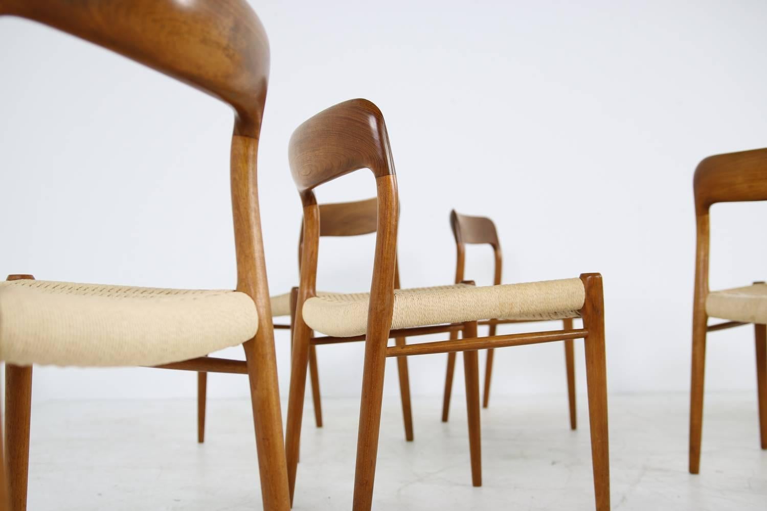Beautiful set of eight dining chairs, Niels Moller Mod. 75 for J.L. Moller. Very good condition, the Danish paper cord (cane) is great, chairs are solid and the wood has fantastic patina.