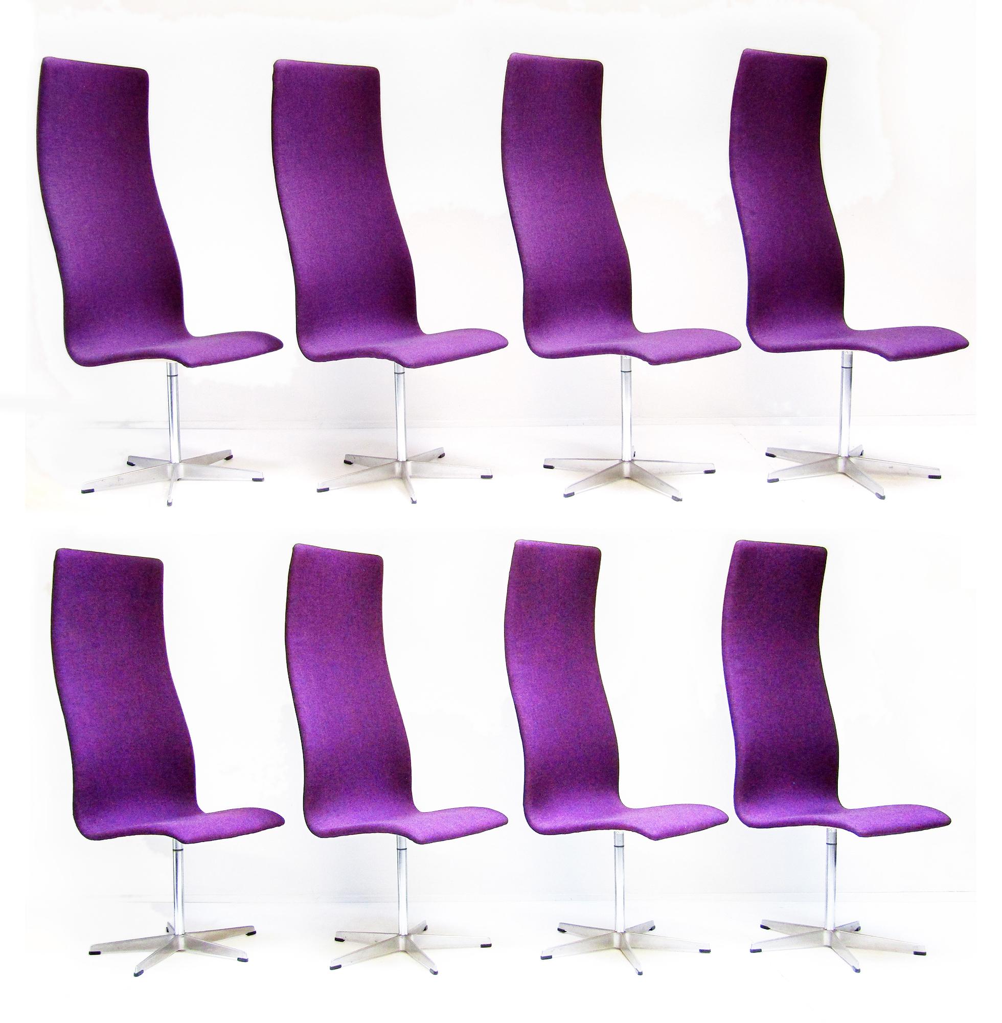 A set of eight vintage 1960s high back Oxford chairs by Arne Jacobsen for Fritz Hansen.

This classic modernist design was created in the early 1960s for St Catherine's College, Oxford University, for use in the banqueting hall. These stately