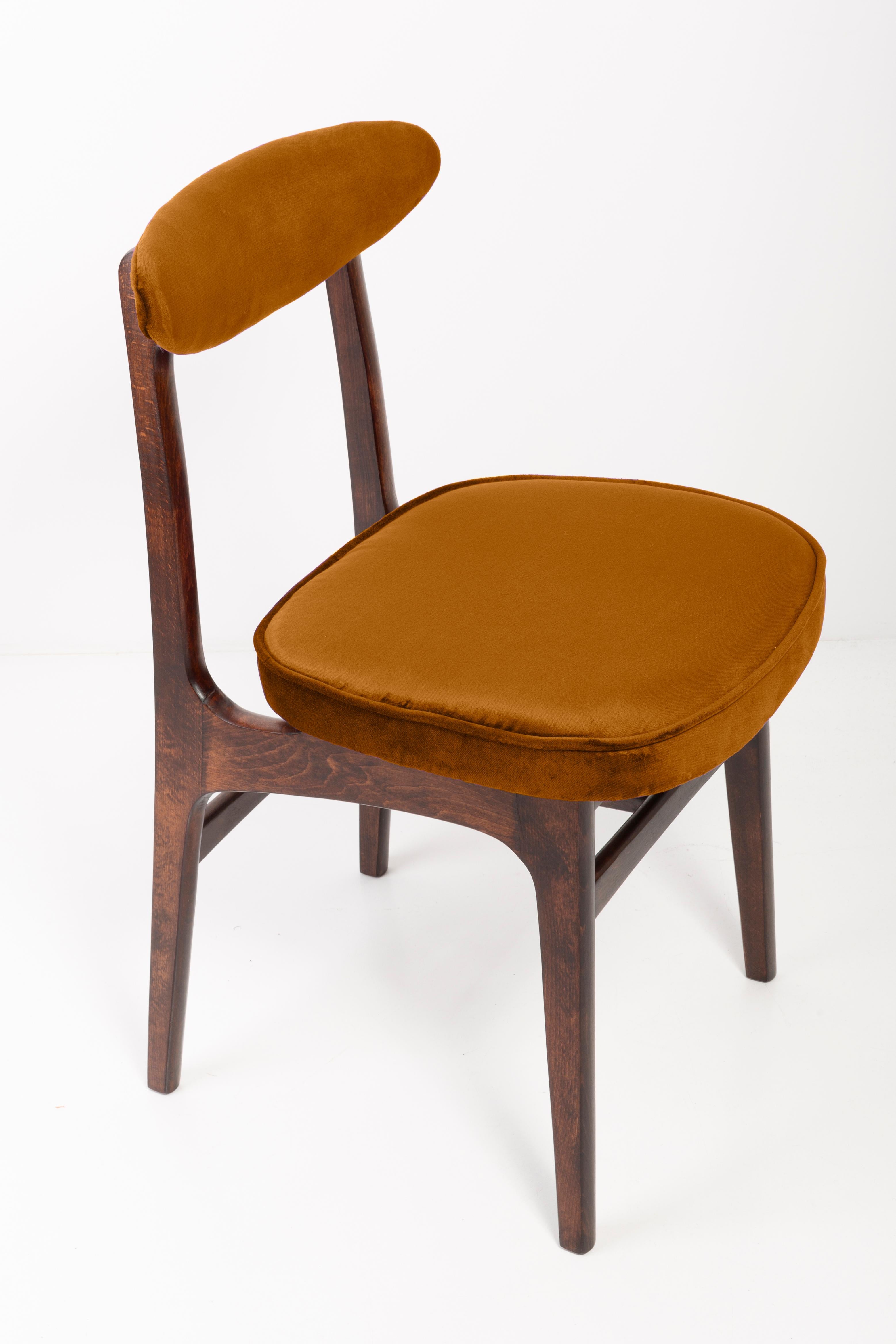 Eight chairs designed by Prof. Rajmund Halas. It has been made of beechwood. Chairs are after undergone a complete upholstery renovation, the woodwork has been refreshed. Seats and backs were dressed in a copper (color 960), durable and pleasant to