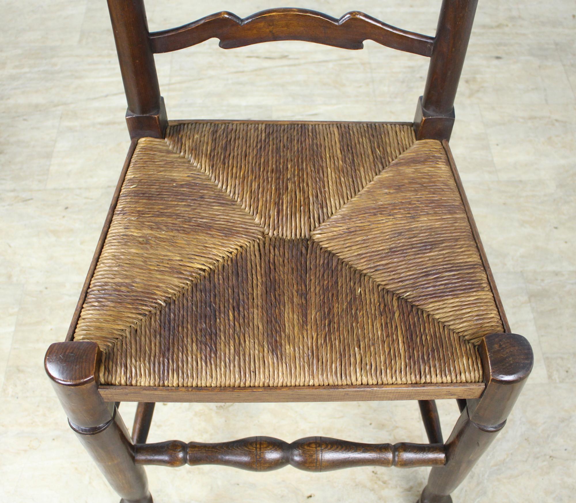 Eight '7 and 1' Antique English Oak Ladder Back Dining Chairs 6