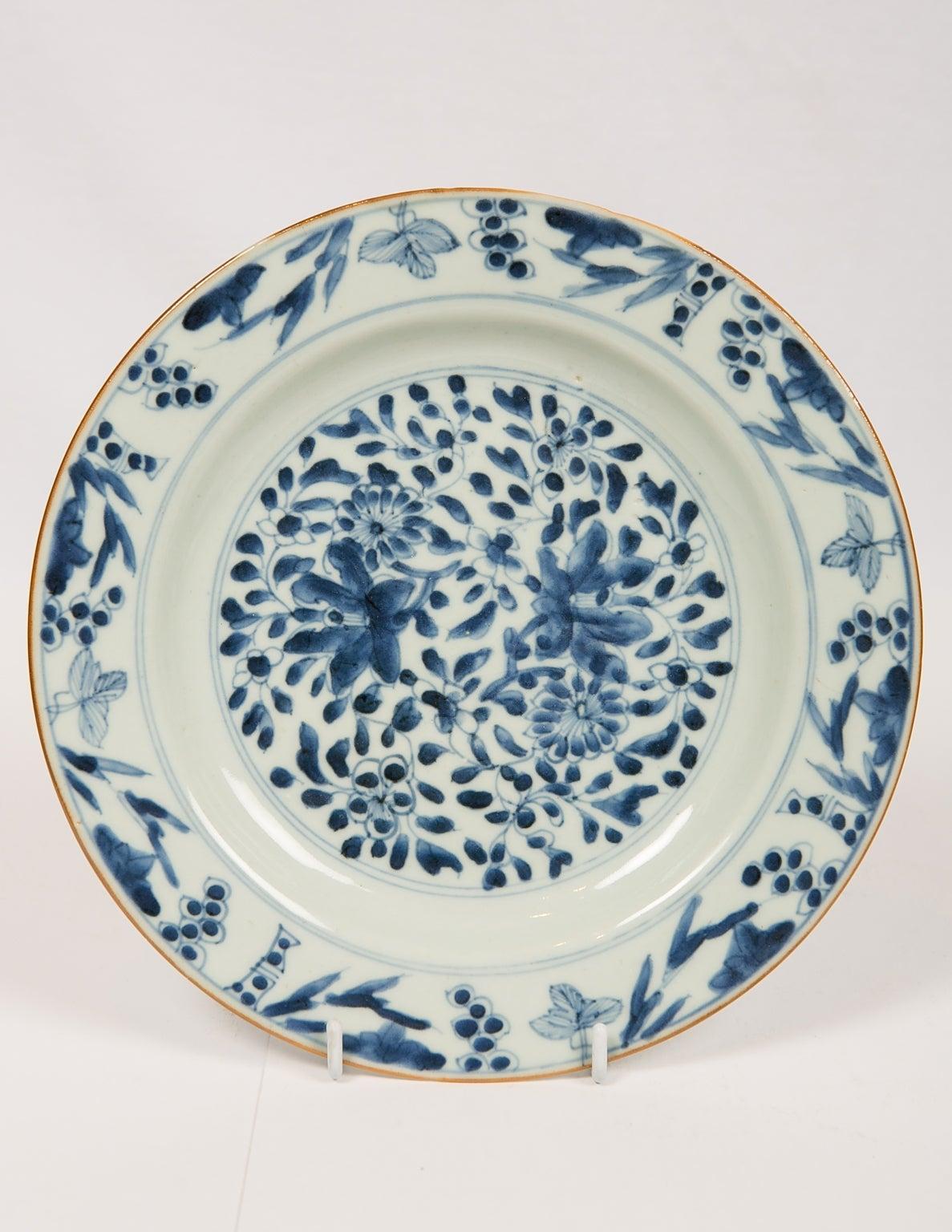 A group of eight Chinese blue and white dishes made in the 18th century during the Qianlong Reign, circa 1770. Made for export to Europe the dishes show a variety of floral patterns all decorated in a medium tone of cobalt blue. 
The plates work