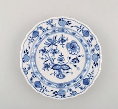 Eight Antique Meissen "Onion Pattern" Plates in Hand Painted Porcelain