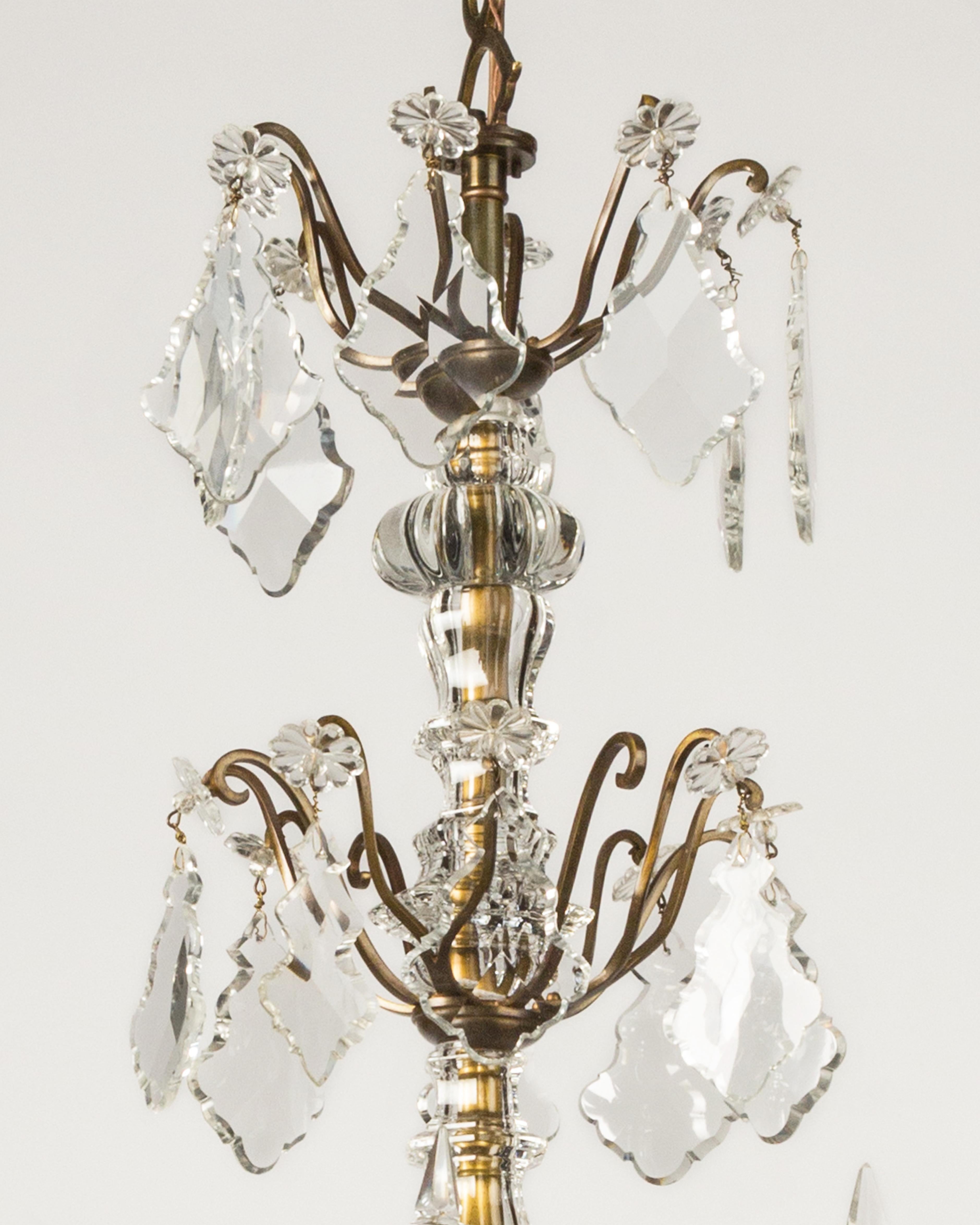 American Eight Arm Brass and Glass Chandelier with Four Tiers of Faceted Crystal Prisms