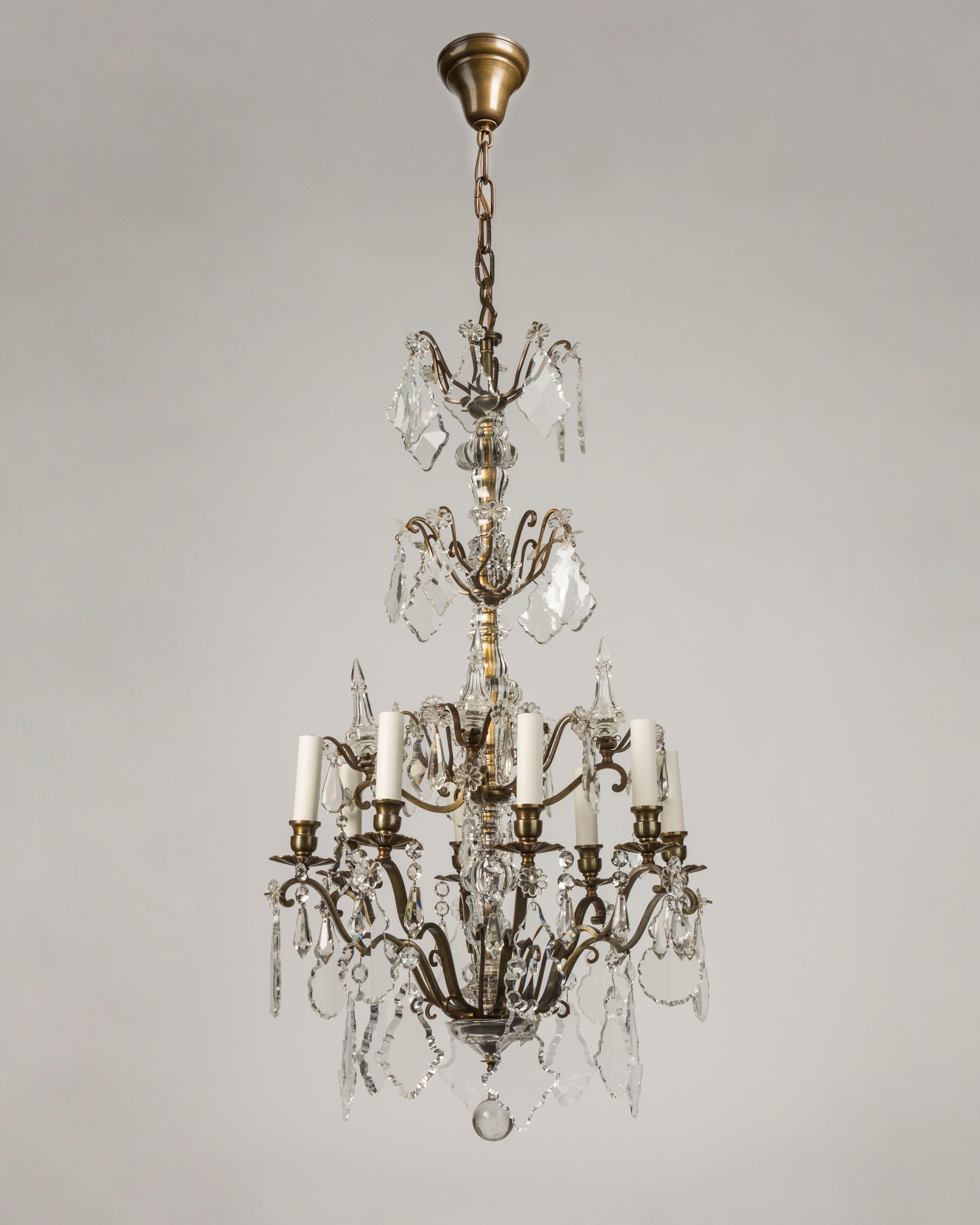 Eight Arm Brass and Glass Chandelier with Four Tiers of Faceted Crystal Prisms 1