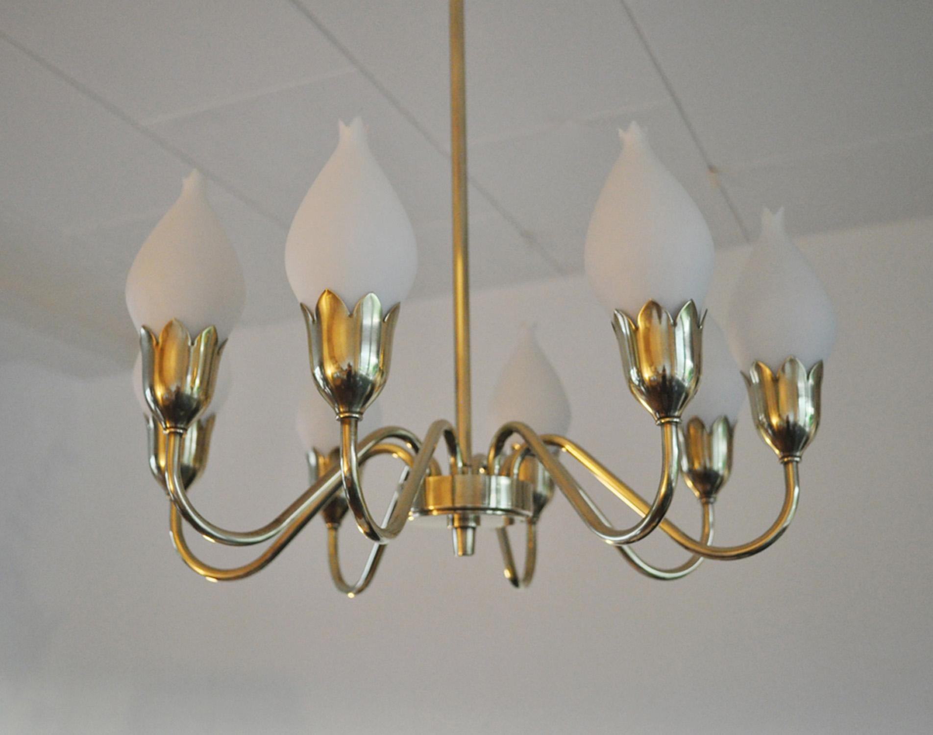 Tulip chandelier in brass and glass designed by Ansgar Fog & Erik Mørup
Produced by Fog & Mørup in Denmark.
Excellent vintage condition with small signs of usage. 
2 available.

 