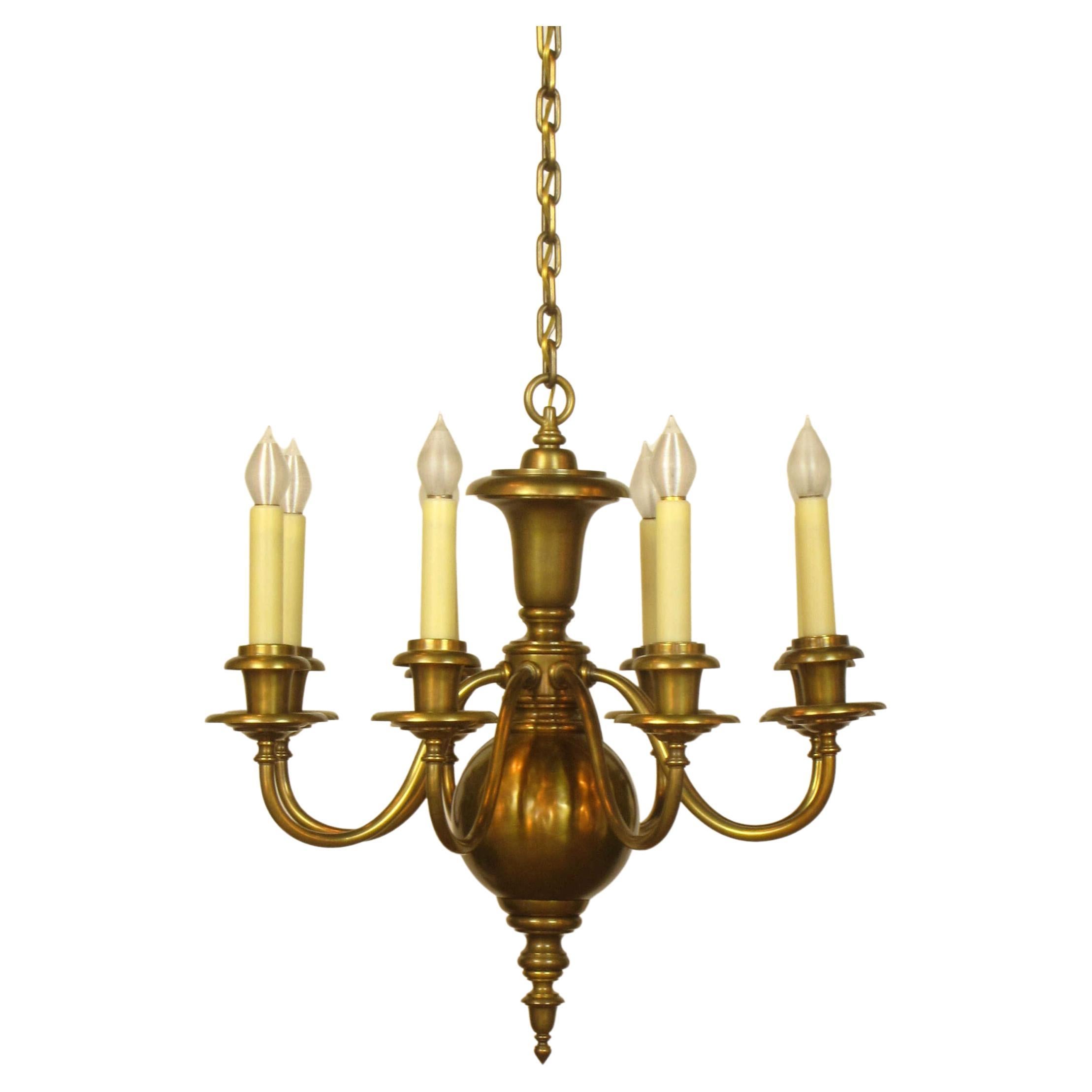 Eight Arm Colonial Style Chandelier For Sale