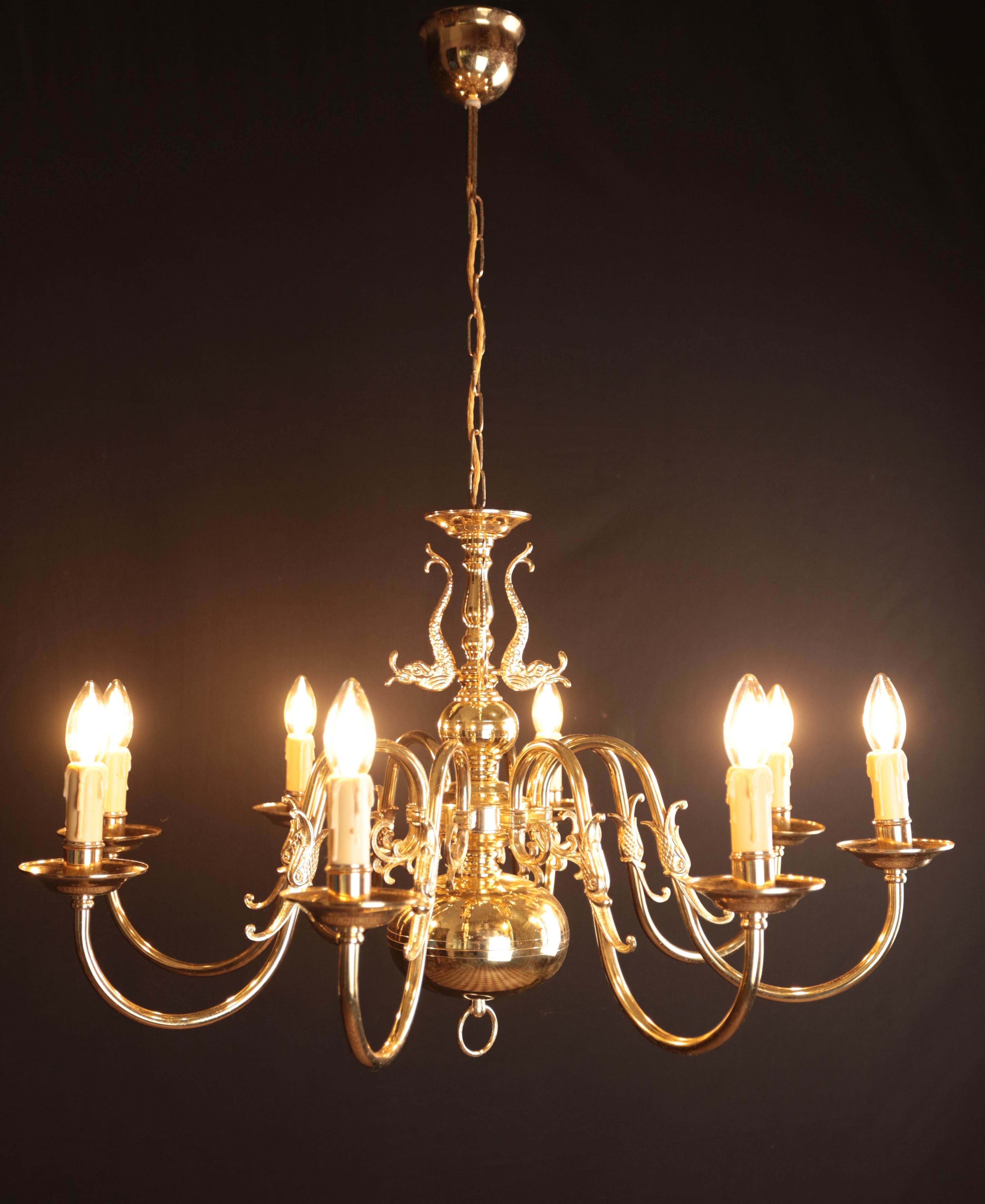 Eight-armed Flemish chandelier. Functional

A beautiful eight-arm Flemish chandelier made of polished brass. The upper part of the chandelier decorated with fish. The chandelier has a completely new copper wiring and new pods + new insides - ready