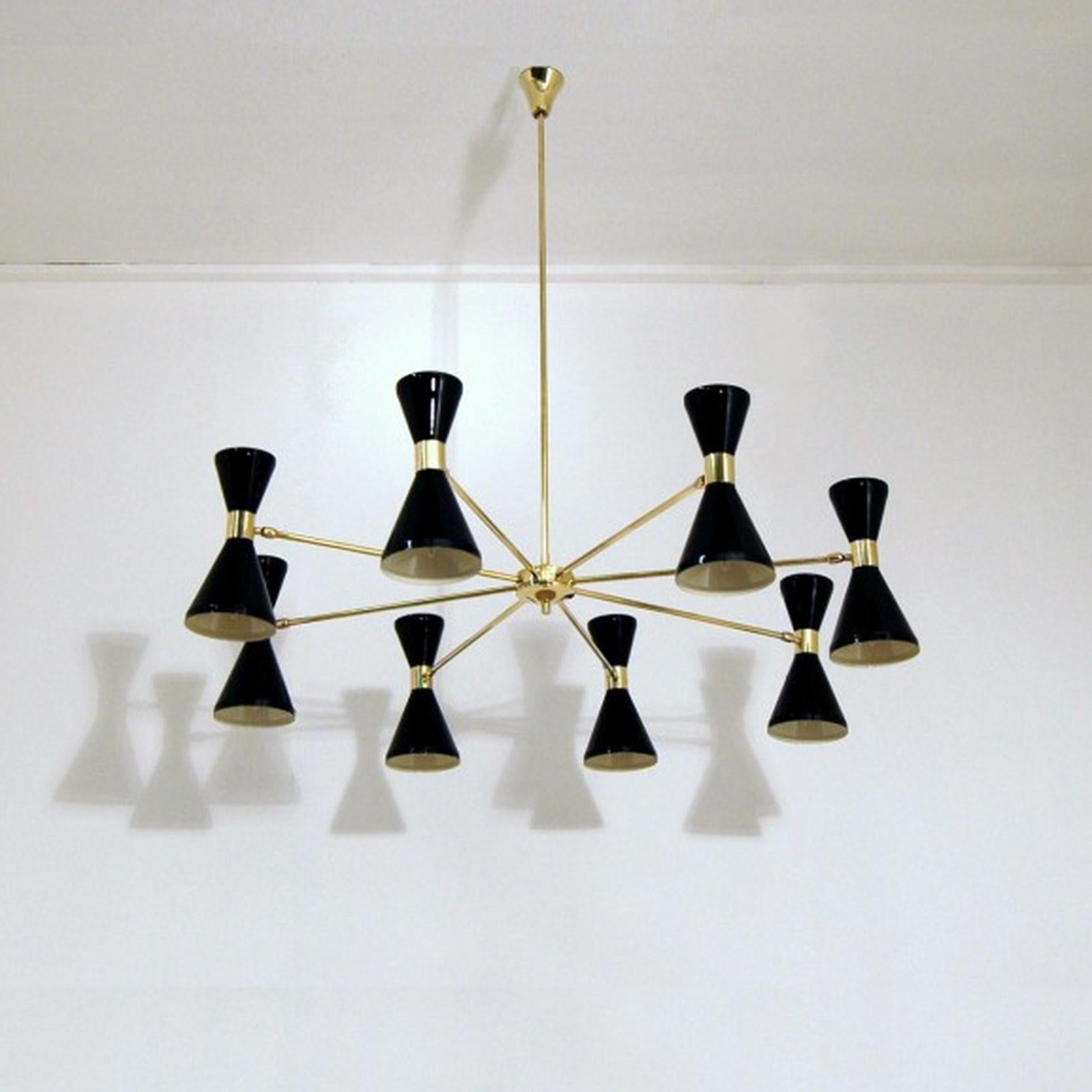 Eight arms brass chandelier, pivot shades, Stilnovo style.
Light up and down, pivoting shades to adjust the light distribution in the room. Customizable in colors and dimensions. 
Dimensions:
Diameter 140 cm, height 100cm.