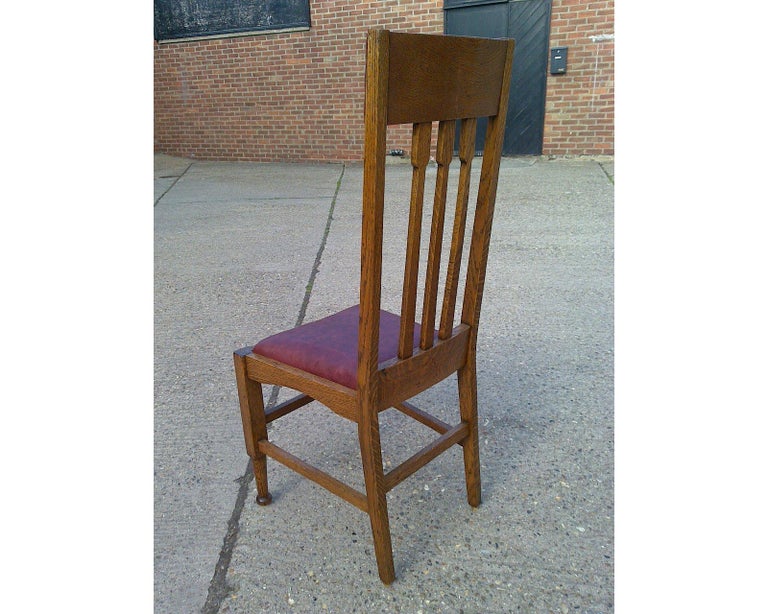 Eight Arts and Crafts Glasgow Style High Back Oak Dining Chairs with