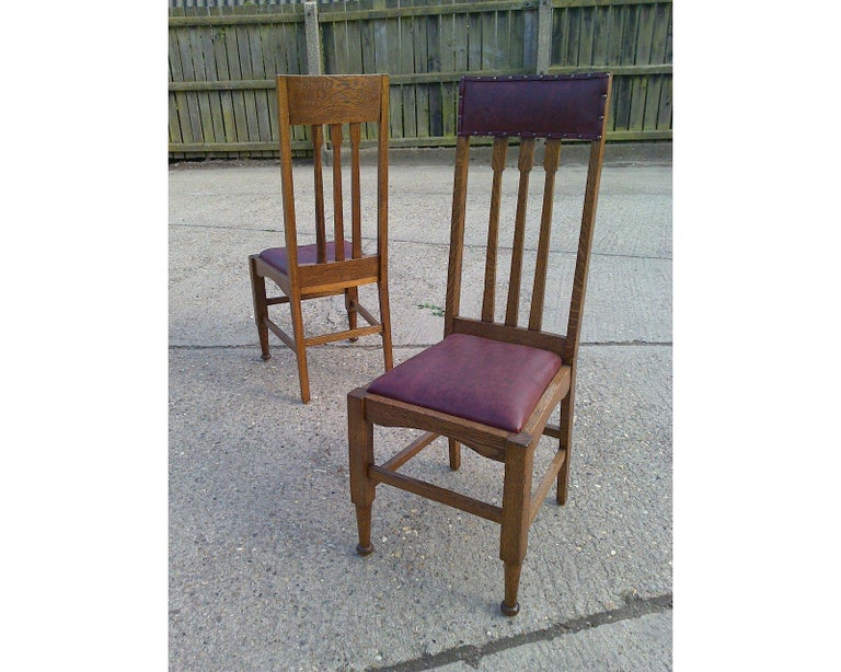 Eight Arts and Crafts Glasgow Style High Back Oak Dining Chairs with
