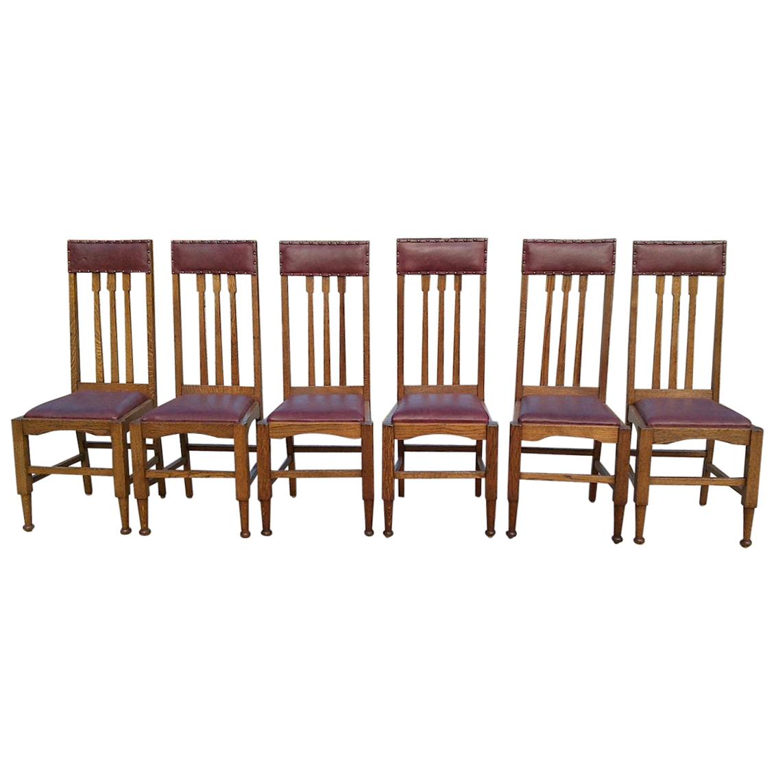 Eight Arts & Crafts Glasgow Style High Back Oak Dining Chairs with Leather Seats