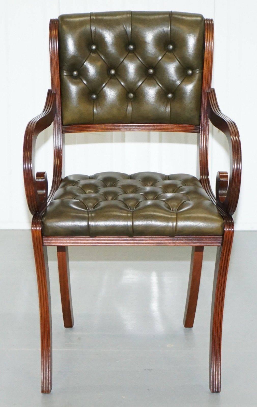 We are delighted to offer for sale this stunning set of eight Beresford & Hicks Chesterfield cattle hide leather mahogany framed dining chairs

Handmade in England using traditional methods, the chairs were made in the late 1960s and are based on