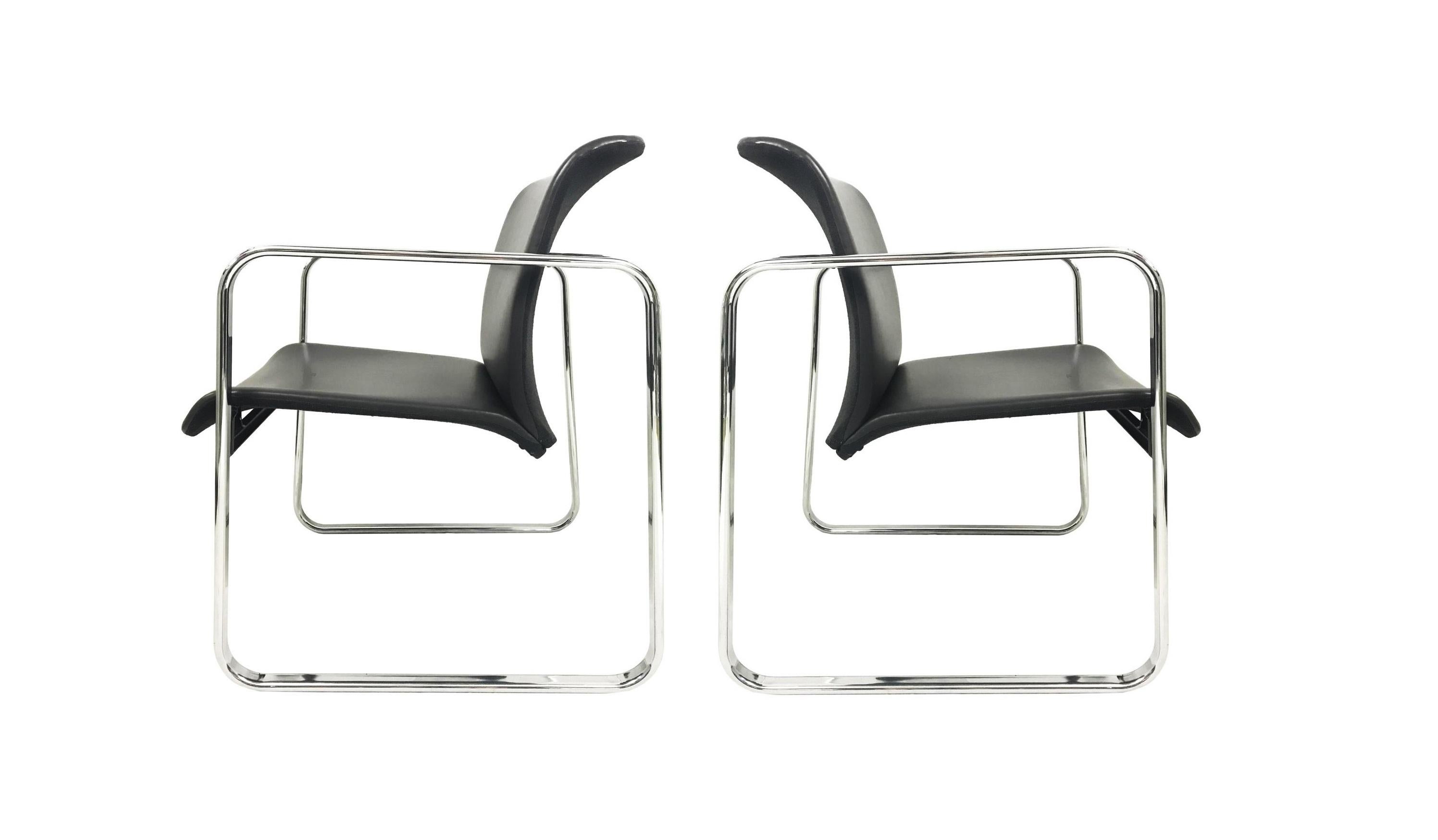 Set of eight tubular series chairs designed by Peter Protzman and Alexander Girard for Herman Miller, circa 1970s. Chairs feature tubular chrome trestle frames which supports the molded and upholstered backs and seats. They are labeled “Herman