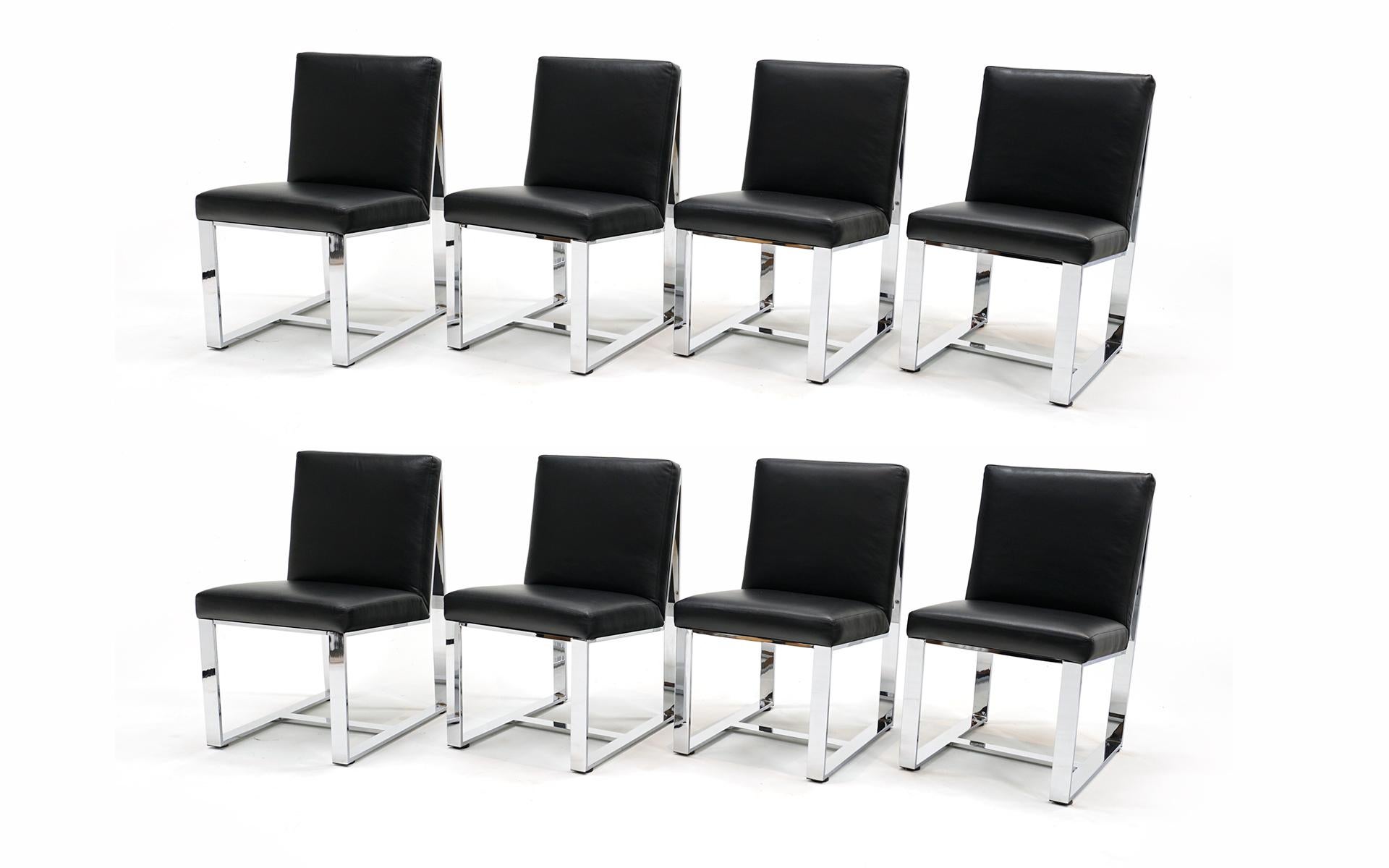 Set of 8 black leather and heavy chromed steel dining chairs designed by Milo Baughman for Thayer Coggin, 1970s.  Heavyweight comfortable design you can sit in for hours.  The leather was updated several years ago and shows little if any wear.  No