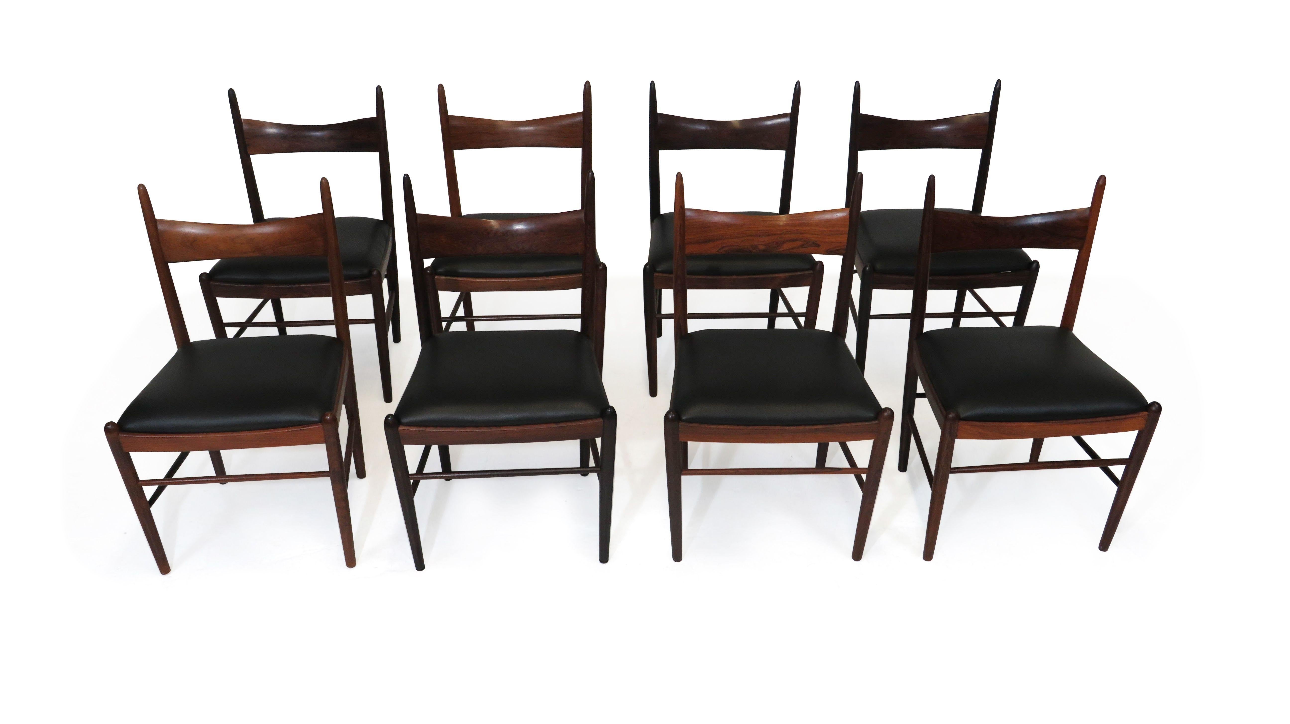 Oiled Eight Brazilian Rosewood Dining Chairs in New Black Leather