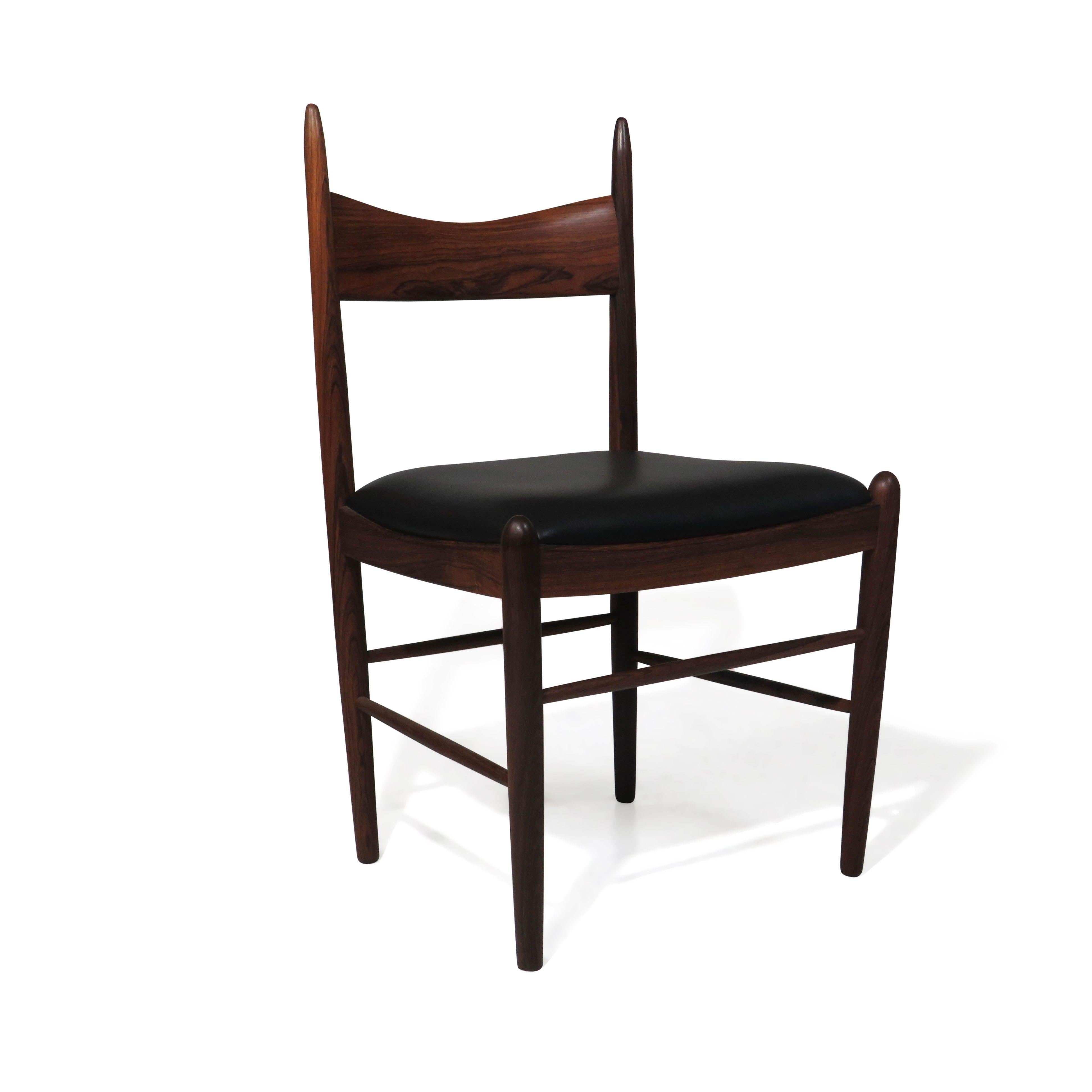 Mid-20th Century Eight Brazilian Rosewood Dining Chairs in New Black Leather