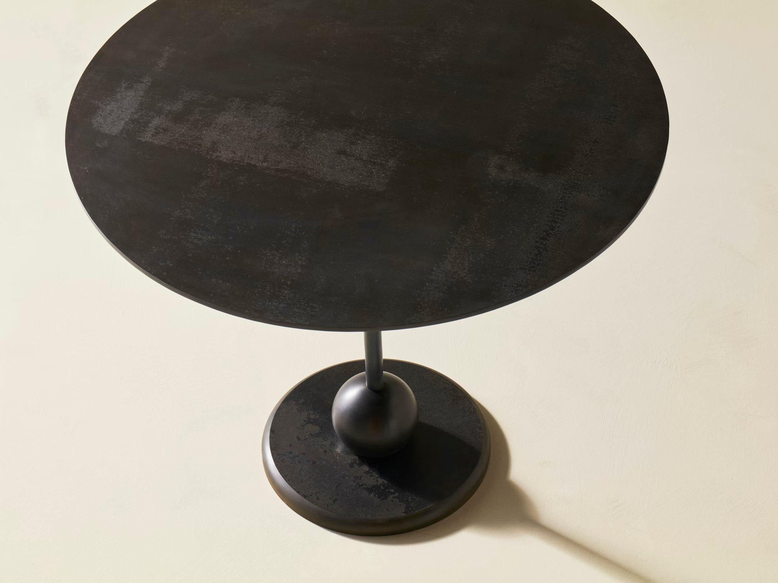 Inspired by eight ball POOL, just like the game, the Eight Café Table is all about well-planned shapes and angles. Its elegant, well-balanced proportions catch the eye and spark the imagination. The base and tabletop are turned from Craft Black