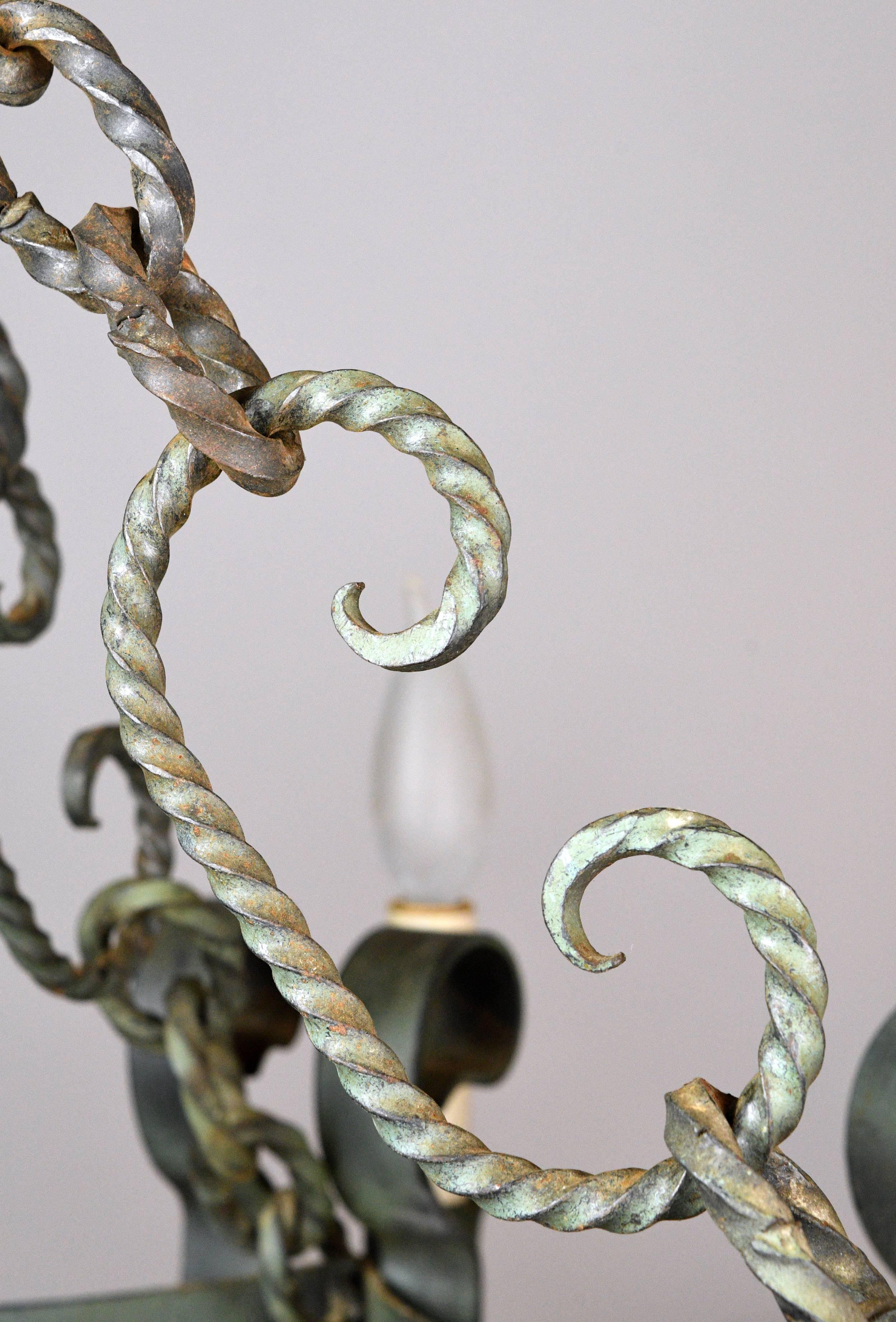 Early 20th Century Eight Candle Italianate Iron Chandelier