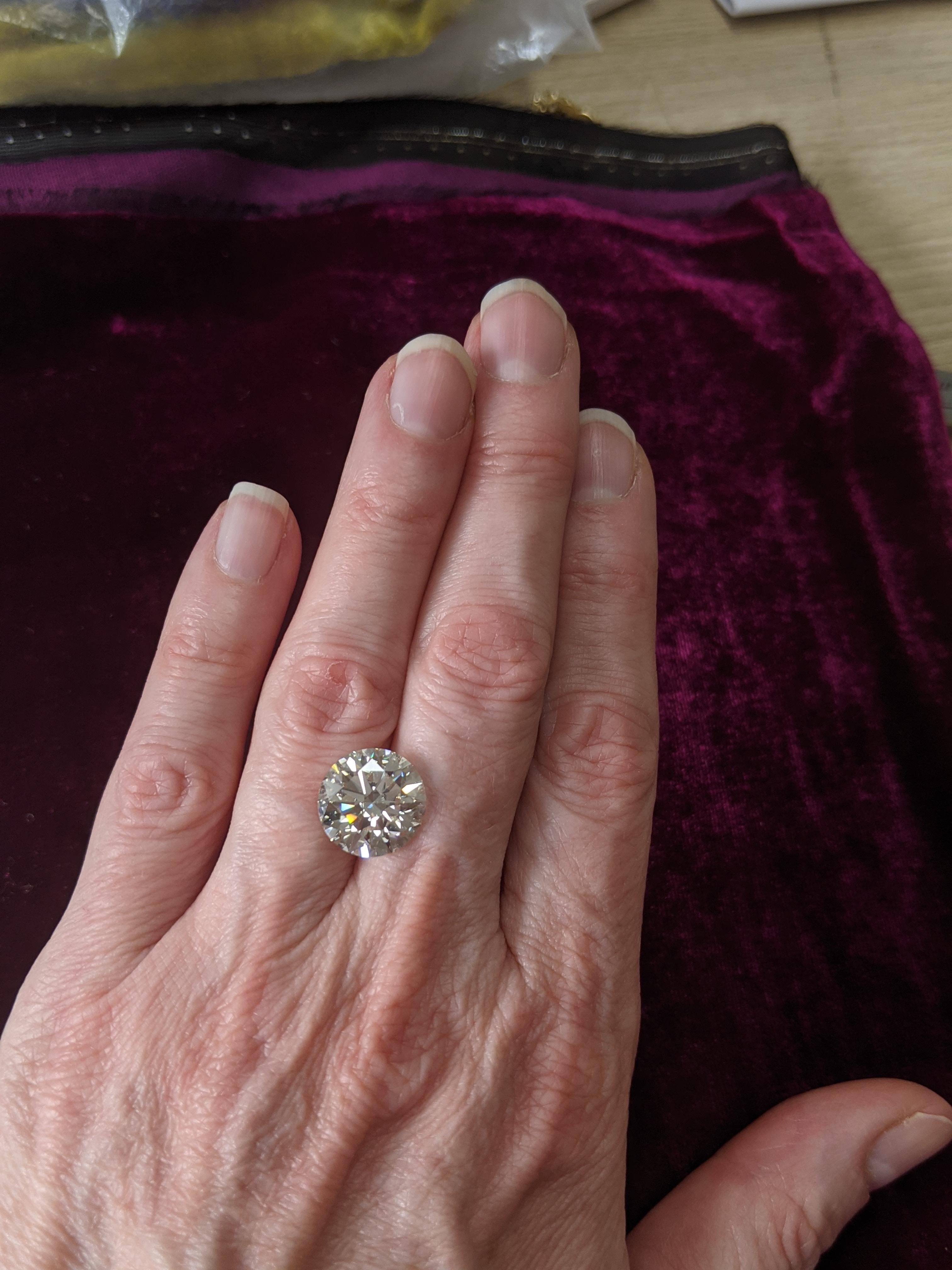 This beautiful 8+ carat diamond has exceptional beauty and clarity  (K, VS2, Excellent cut grade, Excellent Polish and Excellent Symmetry) and is ready to mount in the setting of your choice.    Available for viewing at the diamond cutting office in