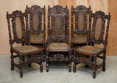 Eight Carved Jacobean Throne Dining Chairs Hand Painted & Embossed Leather Seats